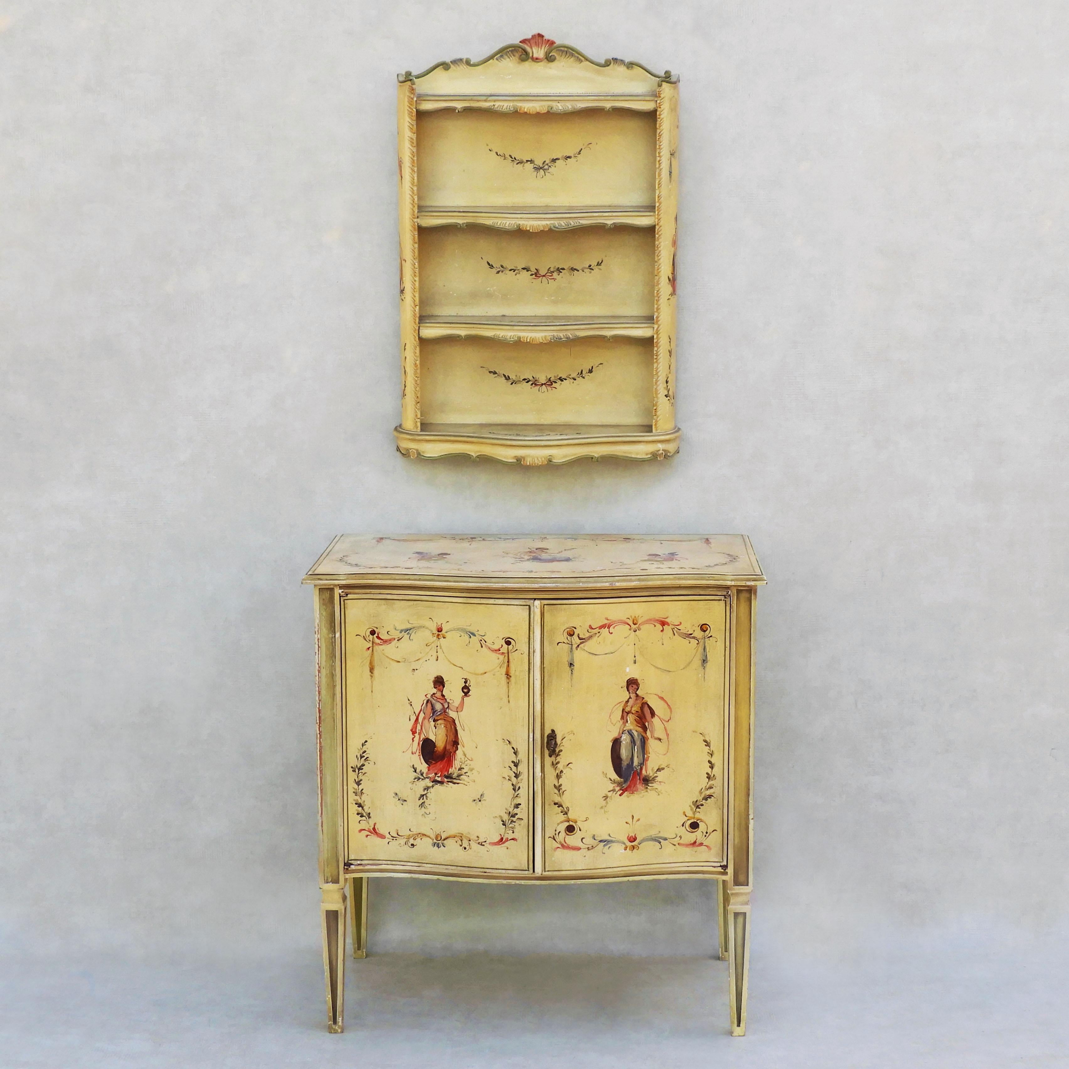 Italian hand-painted ensemble C1960
Beautiful Venetian style painted Cabinet and shelf ensemble, c1960s Italy.
Simple neoclassical style cabinet and complimentary shelf unit, beautifully hand-painted with figurative, floral and scrollwork