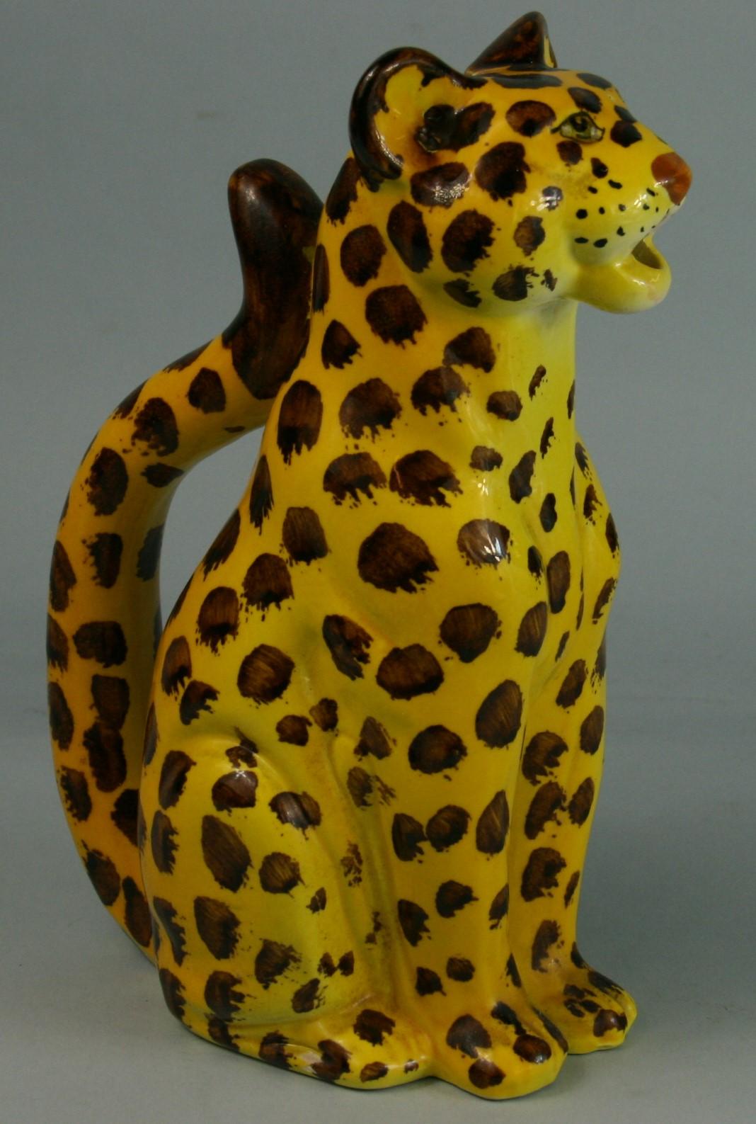 3-645 Eye catching hand painted yellow and black Majolica ceramic  Cheetah jug/pitcher 
A cool accent to any kitchen or to be use as a serving pitcher.
Lovely as part of a ceramic collection displayed in a cabinet 
Marked hand made in Italy REM 1975.