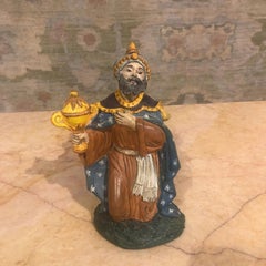 Italian Hand-Painted Glazed Ceramic Kneeling Male Figurine in Blue and Orange