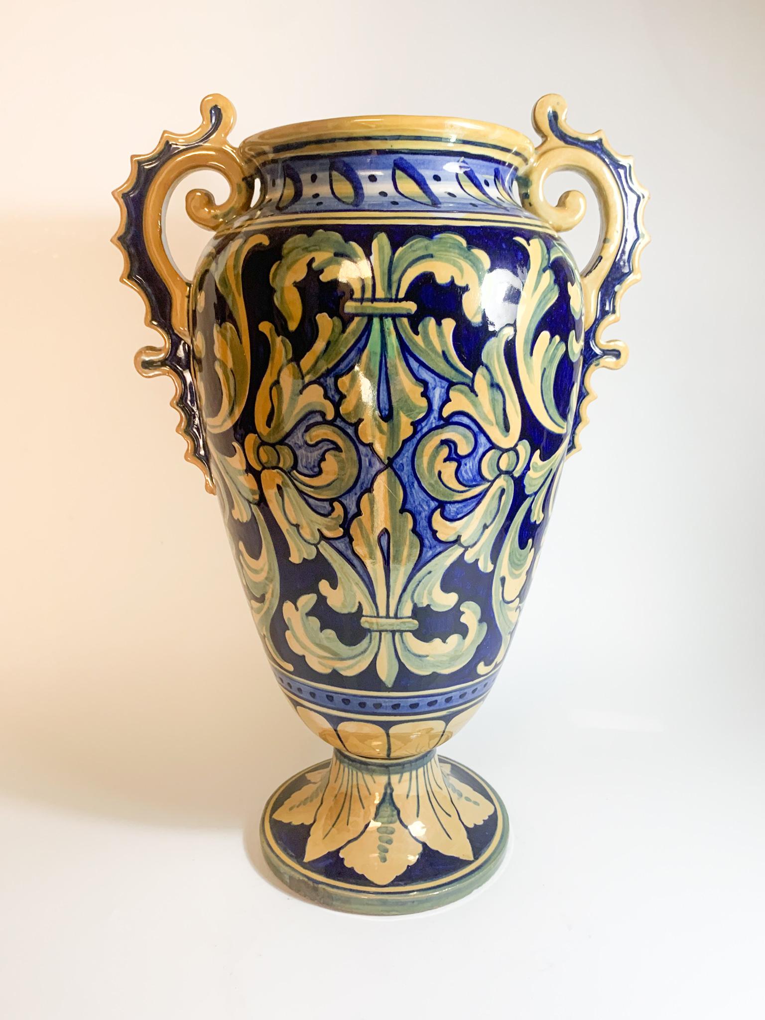 Hand painted blue and iridescent yellow ceramic vase, made by Gualdo Tadino in the 1950s

Ø 23 cm h 33 cm