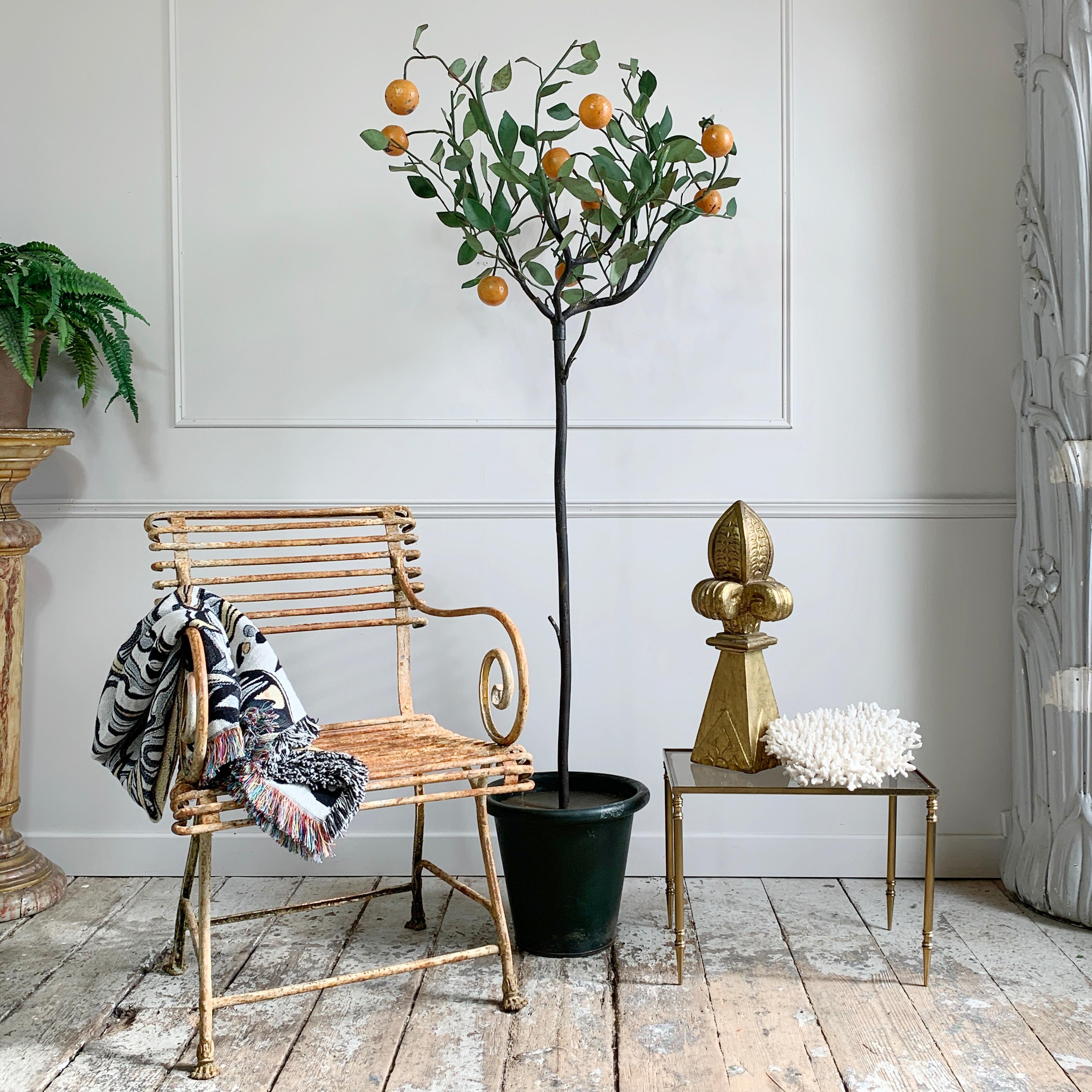 An absolutely beautiful, large 1950’s Iron work, hand painted decorative toleware orange tree, made in Italy, this piece is incredibly intricate and detailed. 

It would look fantastic in a hallway or lobby. Each of the individually hand made