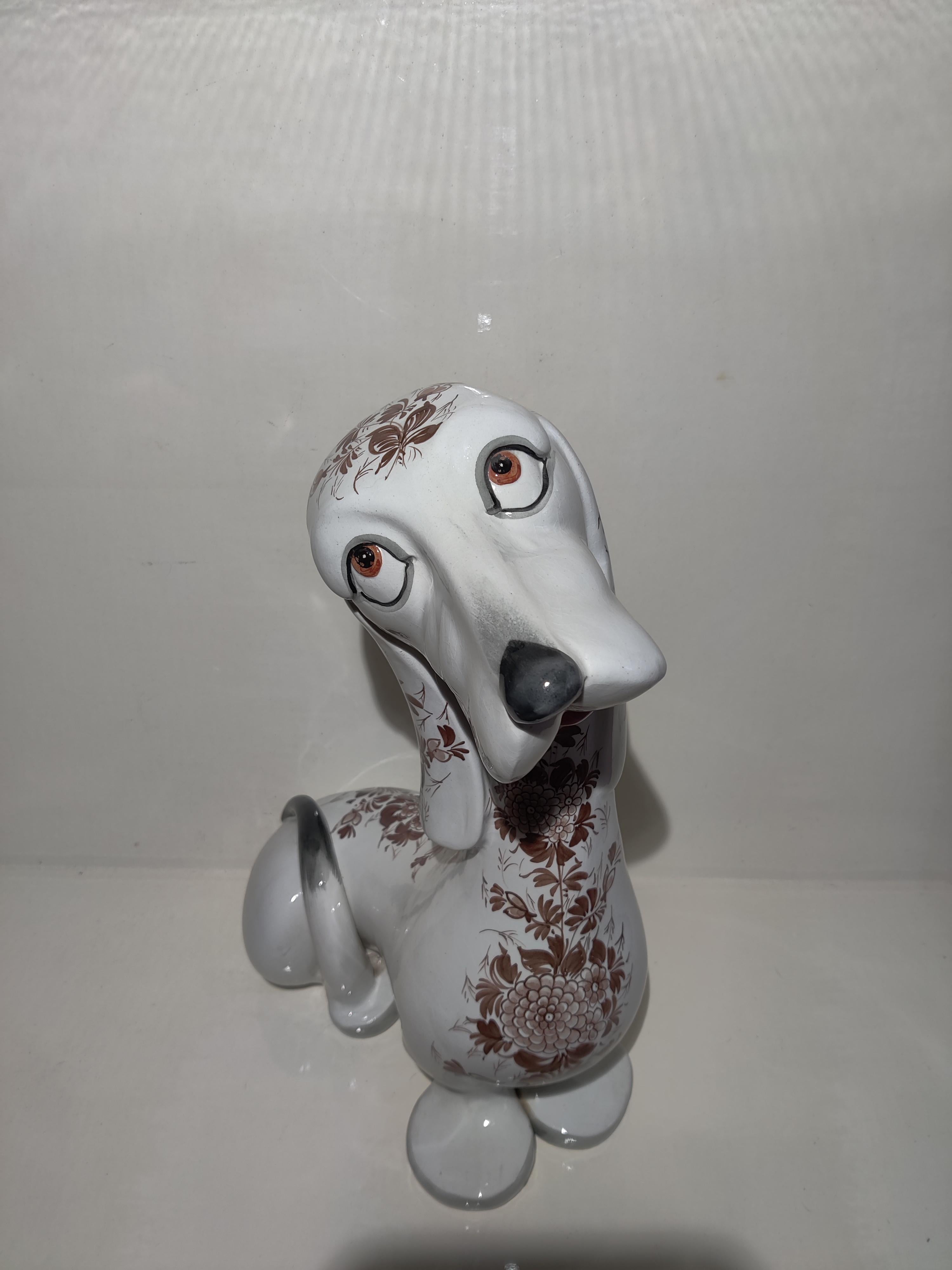 Italian Hand-Painted Life-size Dog
Made and signed Italy
Dog with sad looking eyes and large paws.
Great condition, Hand-painted, no chips.
Head dimensions W 8 x D 6
