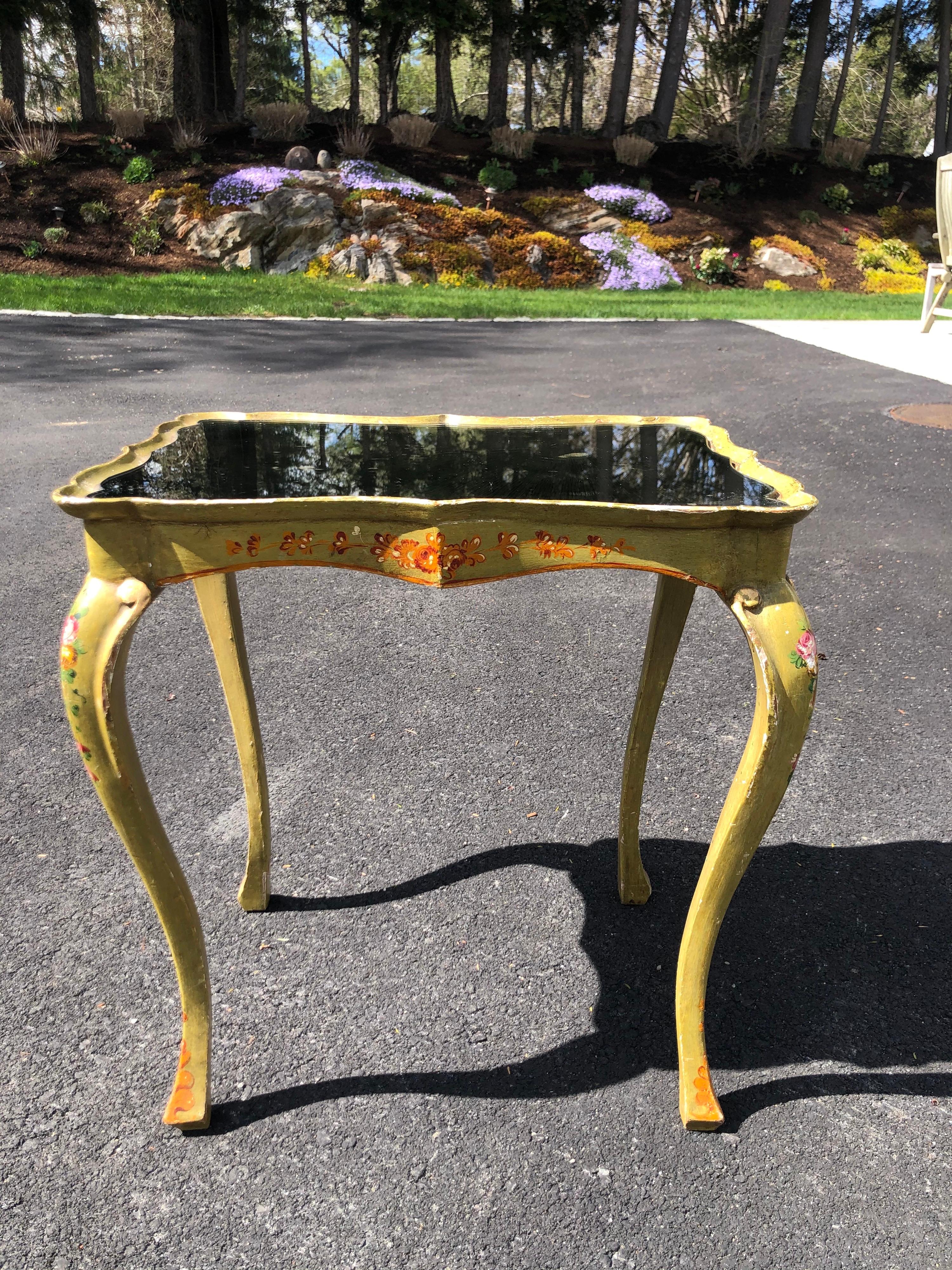 Italian hand painted mirror top side table. Scalloped edges and hand painted design make this table very special. Use in any room , even a bathroom. Custom cut scalloped mirroed top was in this piece when we received it. Not sure if it is original