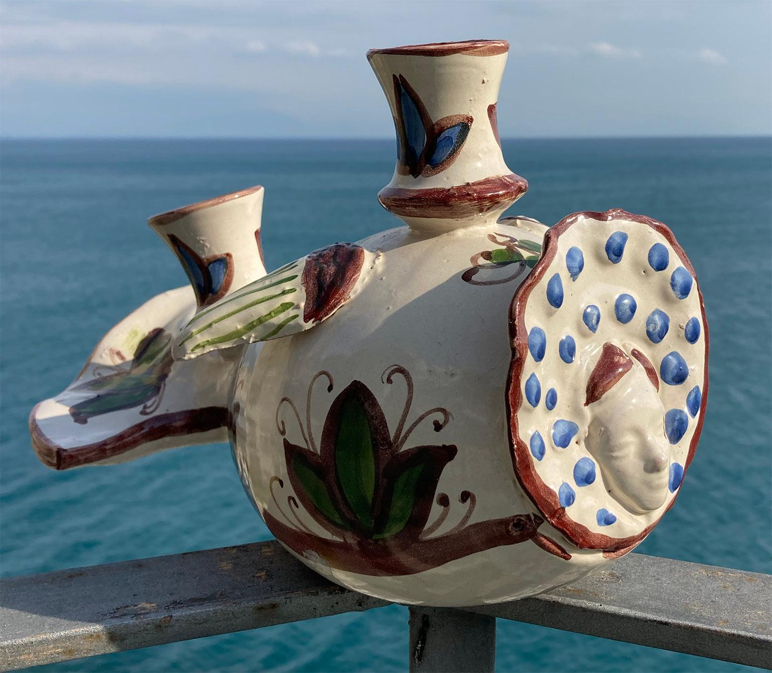 Handmade beautiful ceramic COLAPESCE, (see traditional legend of Colapesce)
decorated ceramic by Sicilian famous ceramist Antonio Piscitello in Santo Stefano di Camastra, Palermo, Signed,
with a traditional woman-fish shape and candle