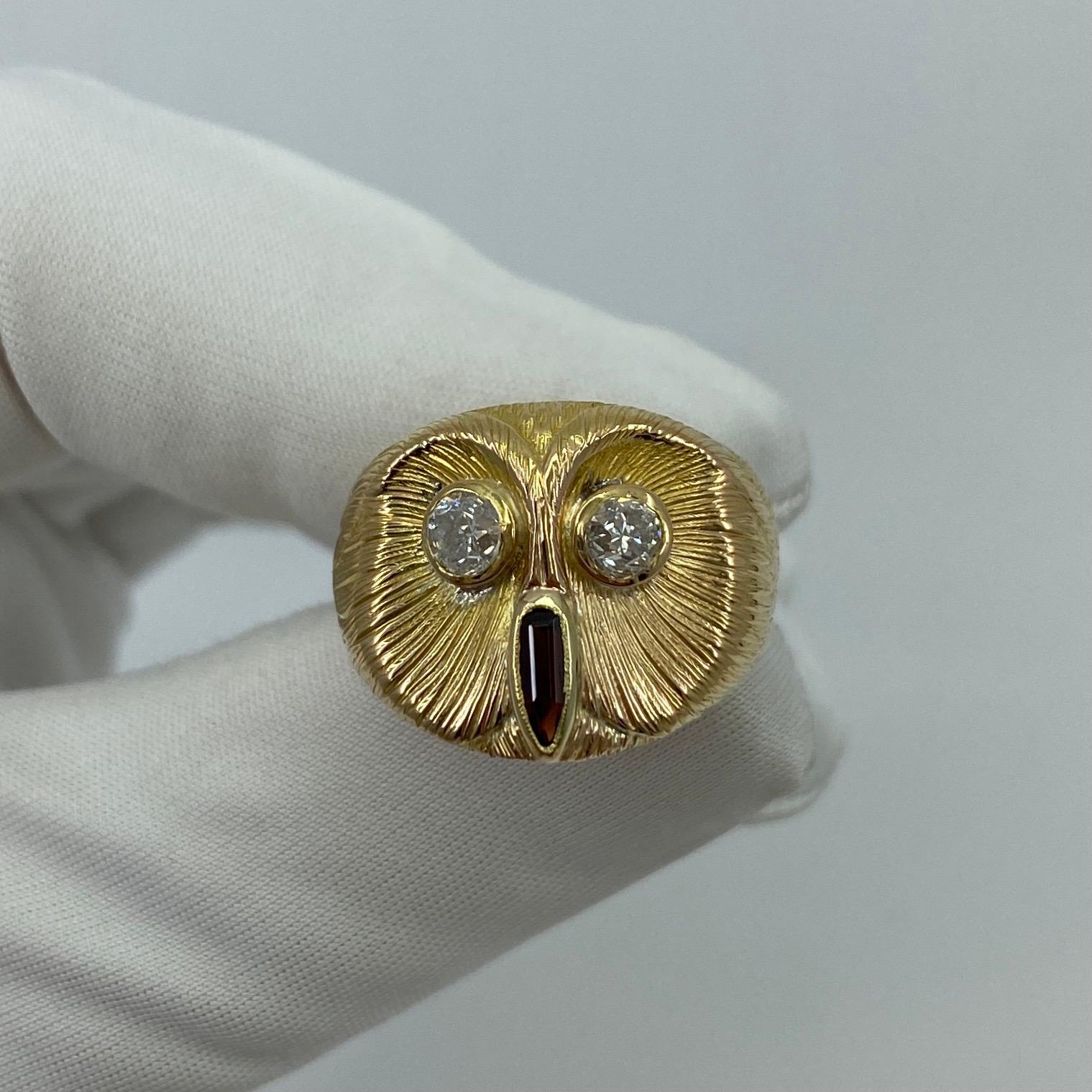 Handmade Italian Diamond & Garnet 18K Yellow Gold Vintage Owl Ring.

Stunning and unique designed handmade owl ring with 2 old cut diamonds for eyes (approx 0.70ct G/H Colour and SI1-2 clarity) and a deep red rhodolite garnet for the nose (approx