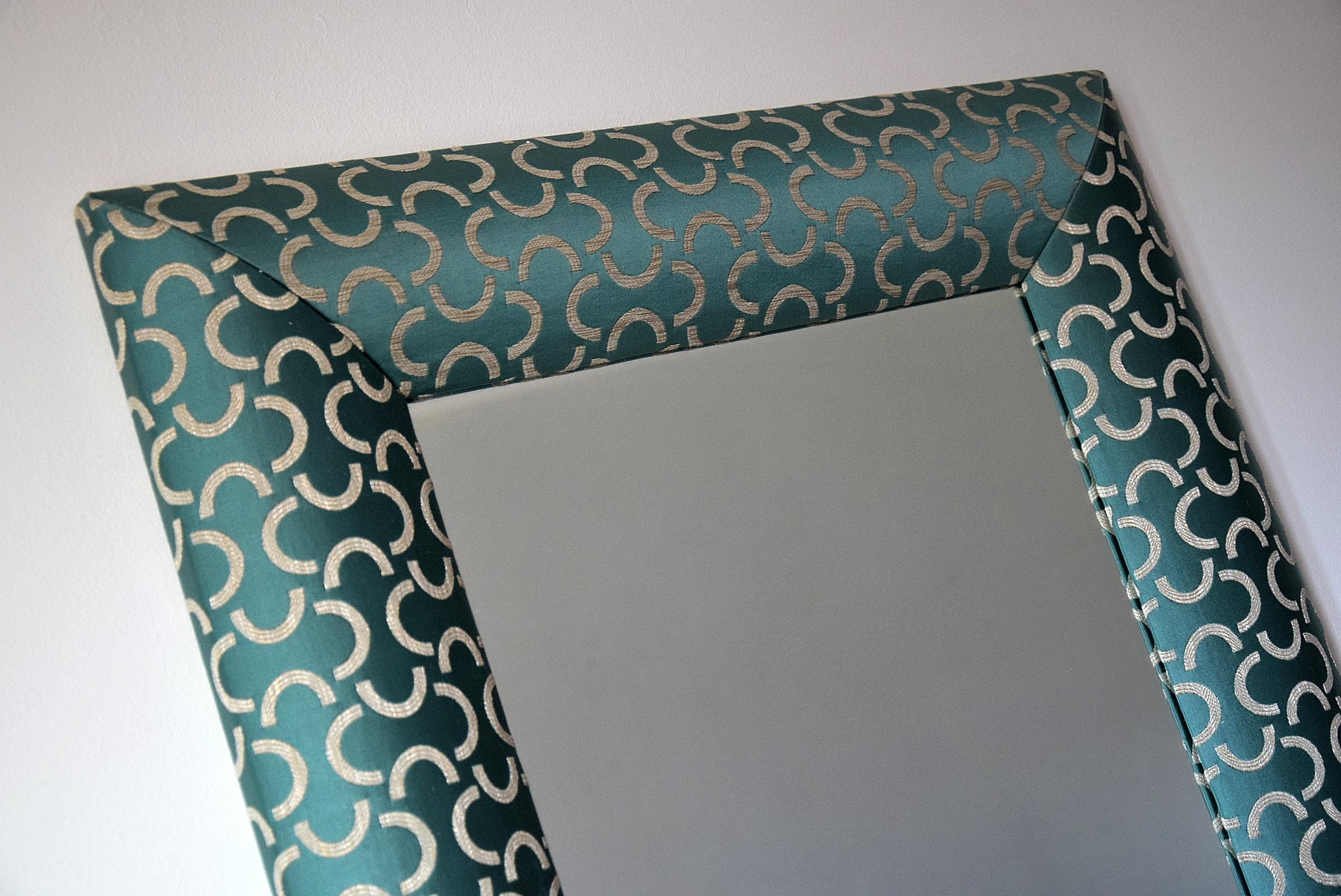 Unique Italian hand made mirror. 
Gorgeous mirrors with a solid wooden frame upholstered with beautiful Italian fabric. . 

Measurements: H.130 x W.60 x D.6 cm.

 