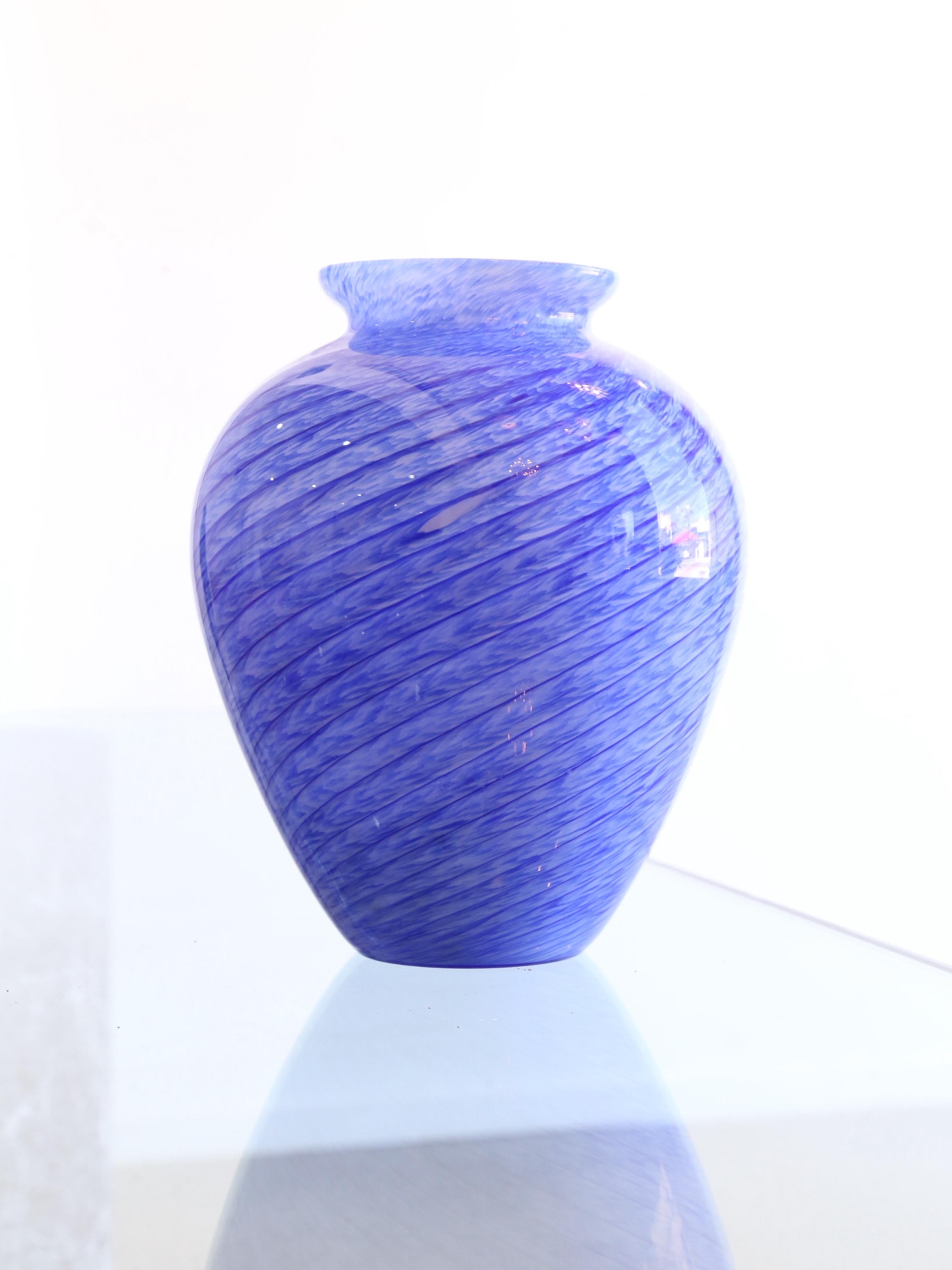 Unique blue and white stripes Murano vase or centrepiece. 
During this period, Italian glassmakers were at the forefront of the modernist movement in glass design, creating pieces that were both functional and aesthetically stunning.

Some of the