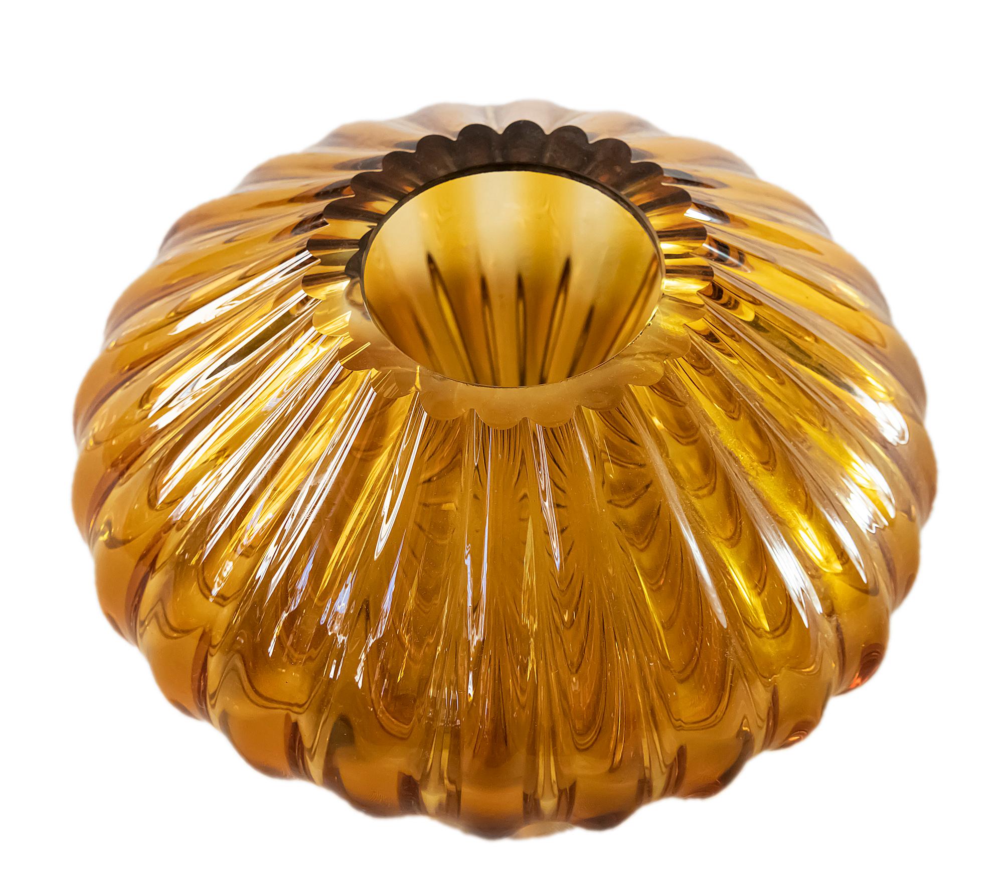 Italian handmade vase is made of ambra color Murano glass.    
  
