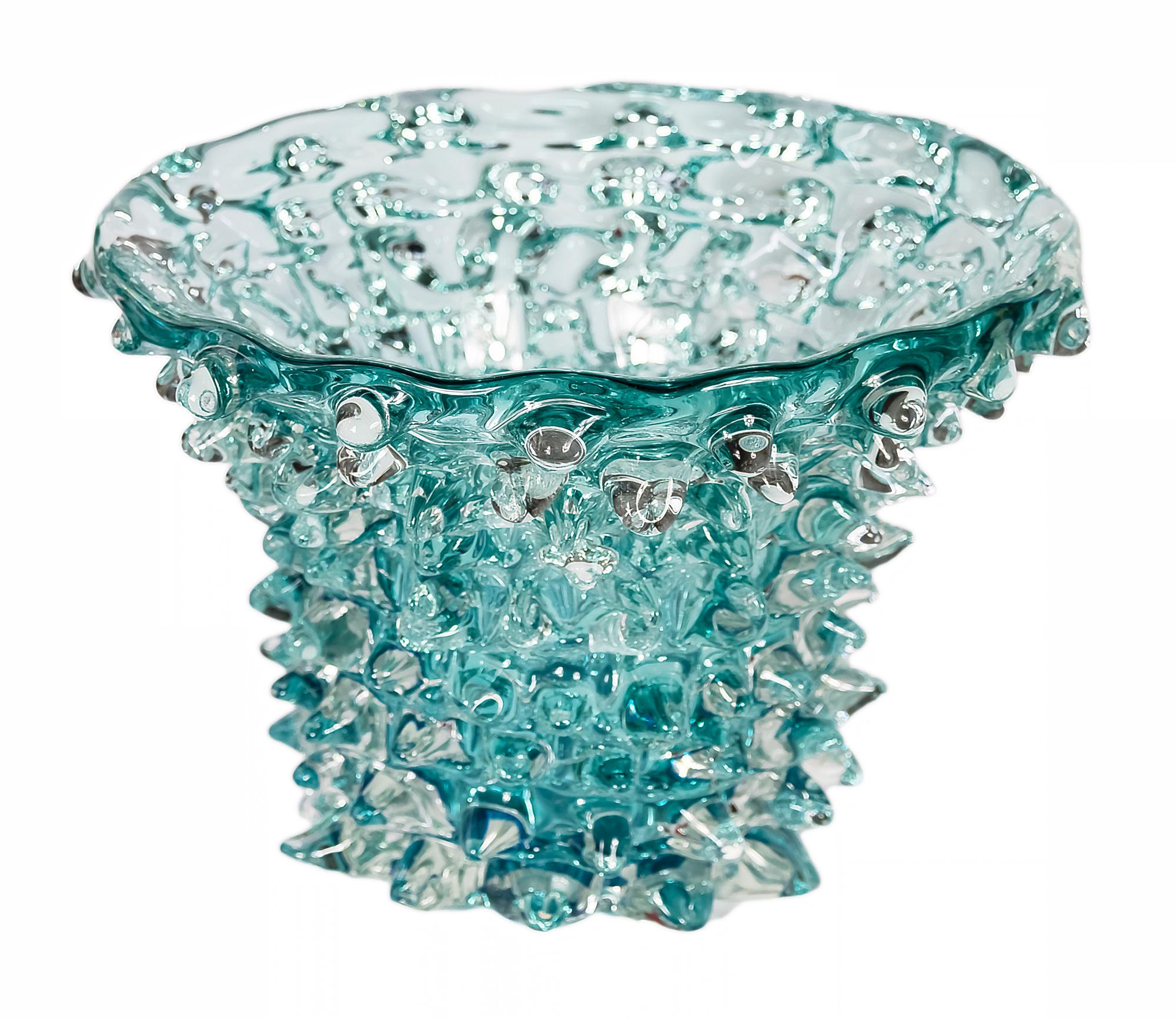 Italian handmade Murano glass vase, signed E. Camozzo.
The glass is emerald green/aquamarine colour. 
This vase is solid and very heavy.