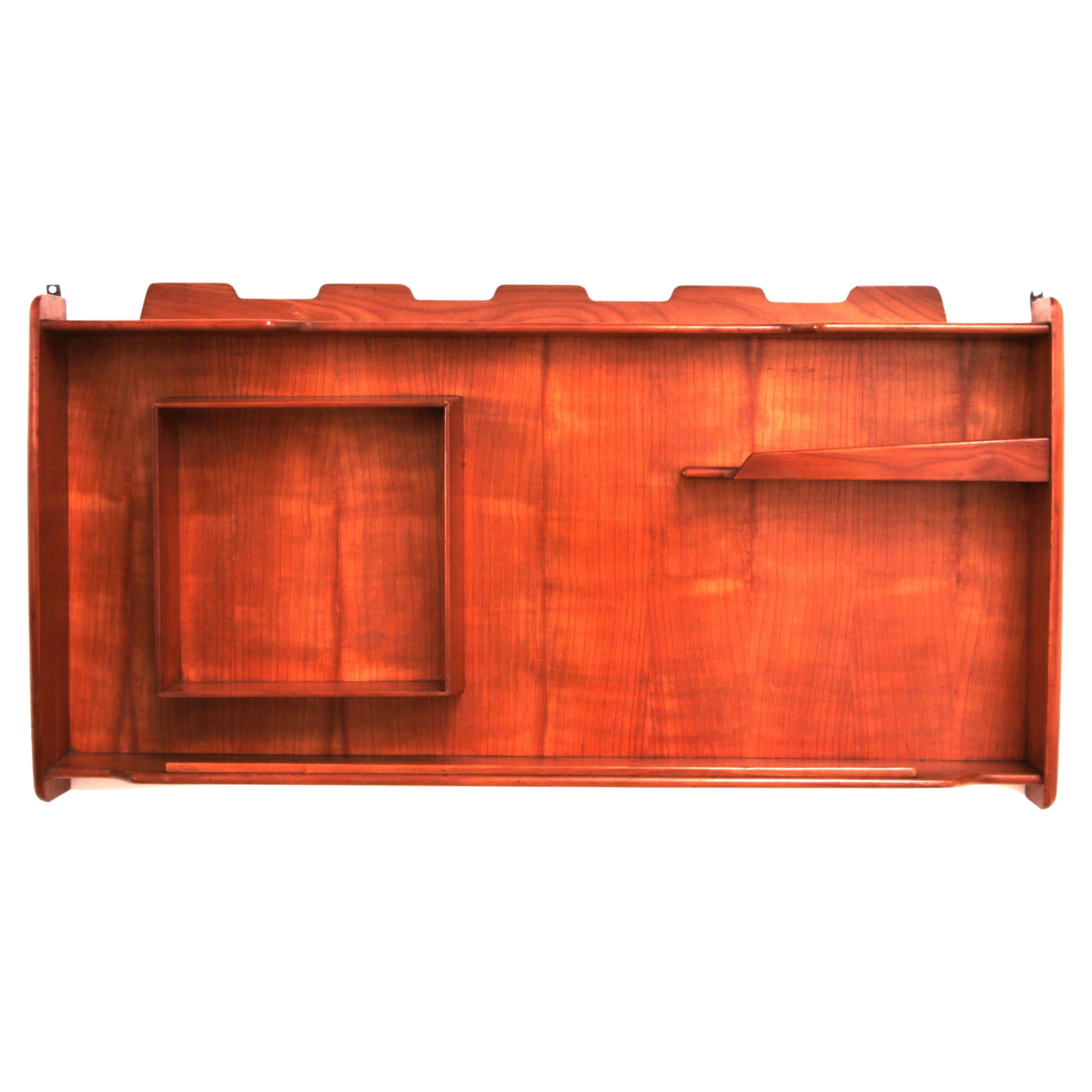 Italian Handmade Walnut wall cabinet from the 1960s. For Sale