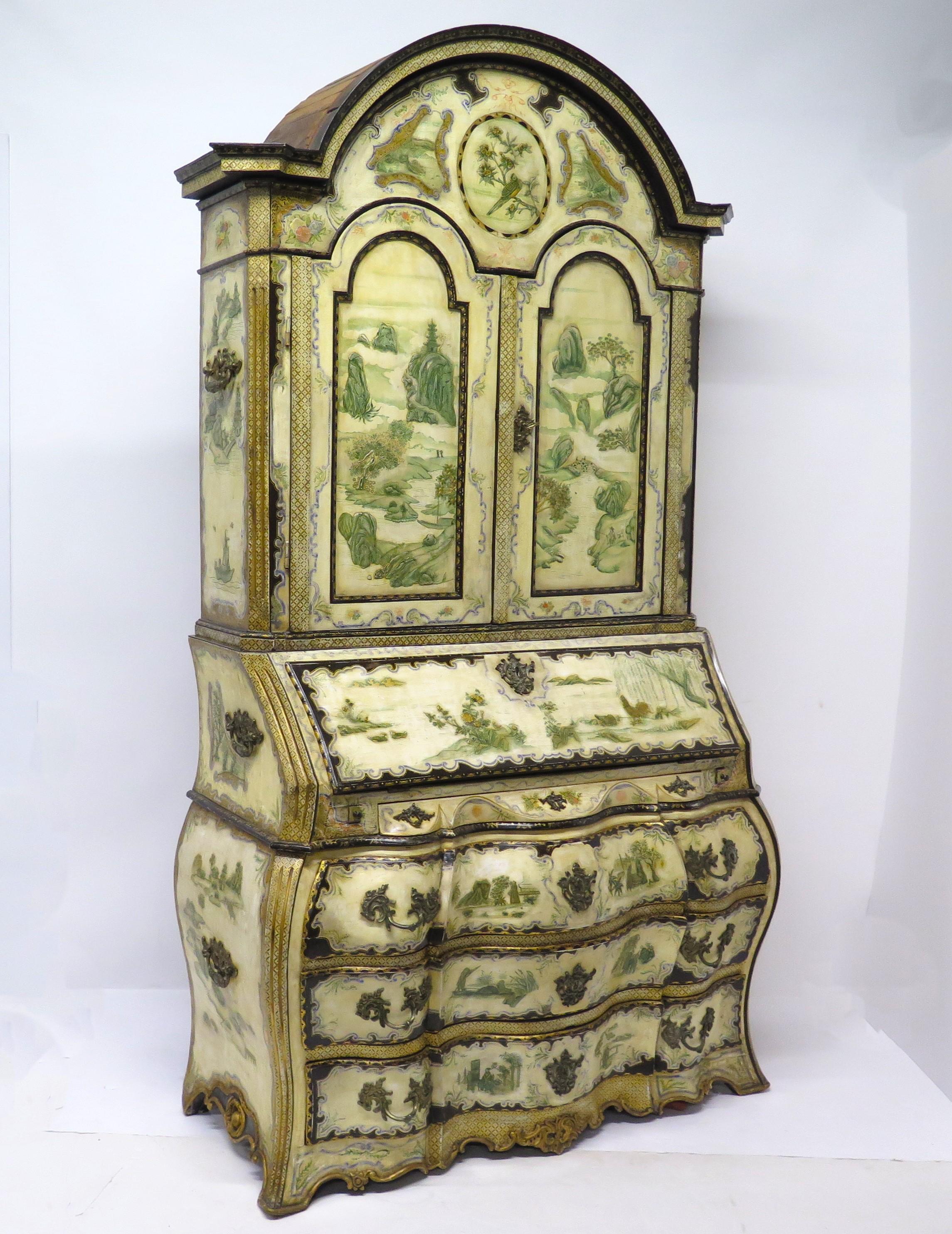 Italian handpainted secretary / desk in chinoiserie design, top features molded shape cornice with two doors revealing three shelves and two small drawers, in the lower part is a beautiful fall front desk decorated and painted, further down are four