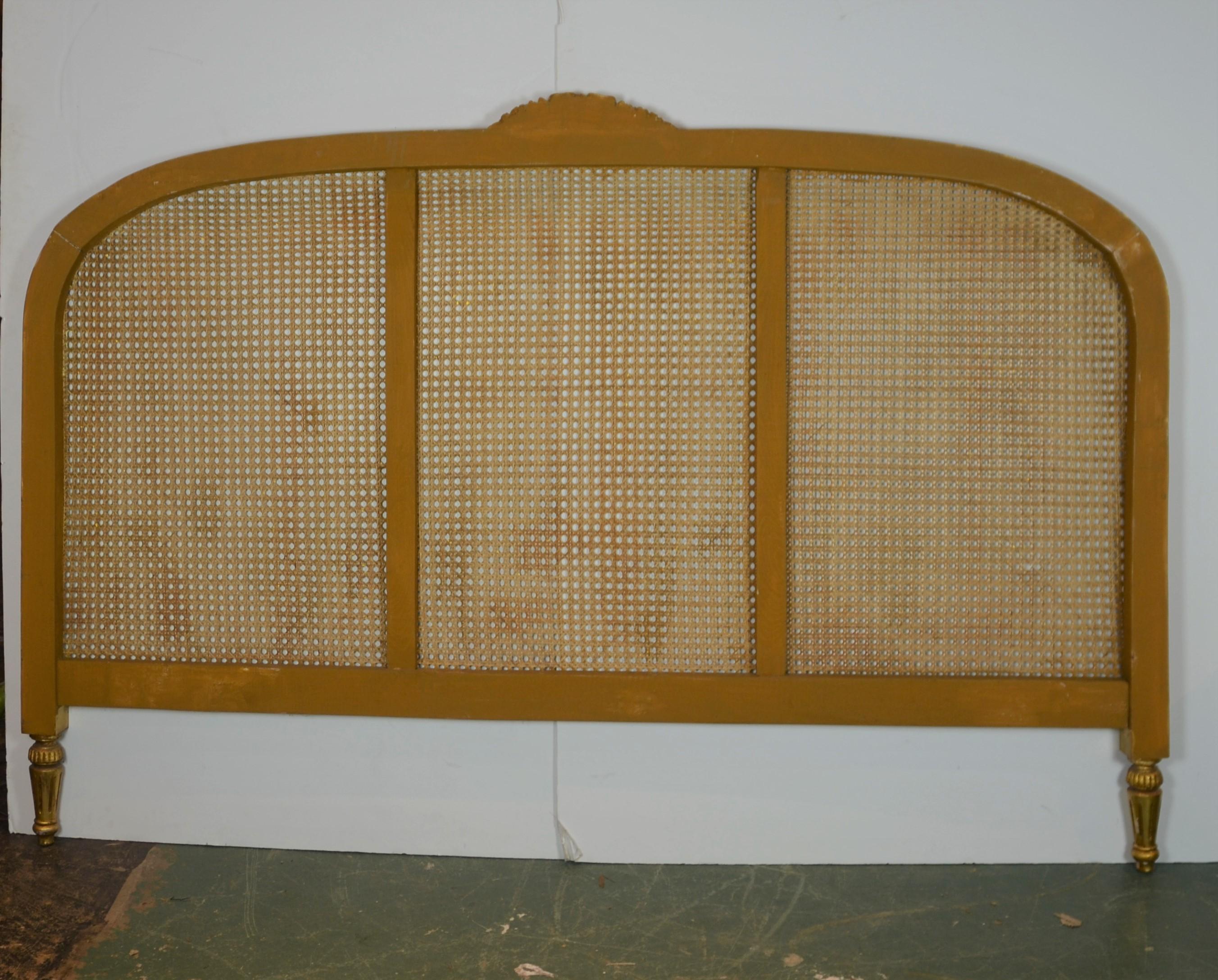 Italian cane and wood carved headboard.
King size.