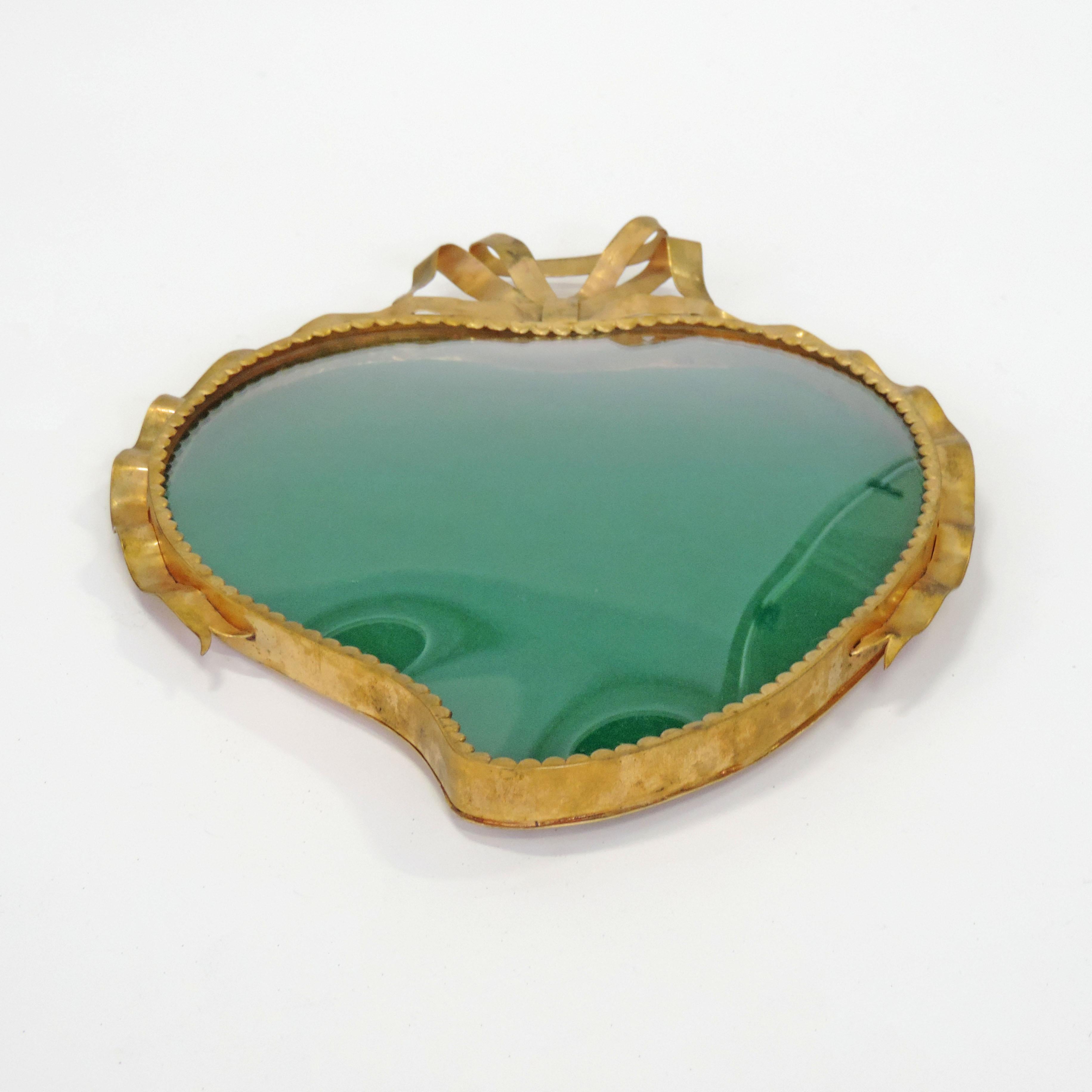 Italian heart-shaped gold metal wall frame. Convex glass.
Attributed to Cesare Lacca.