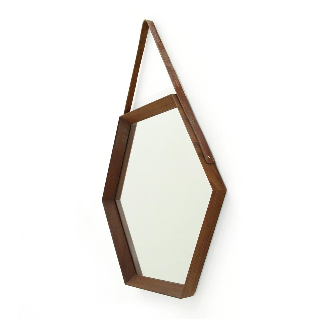 Italian manufacturing mirror produced in the 1960s.
Hexagonal teak frame.
Leather belt.
Good general conditions, some signs due to normal use over time.

Dimensions: Width 55 cm, depth 3,5 cm, height 48 cm.