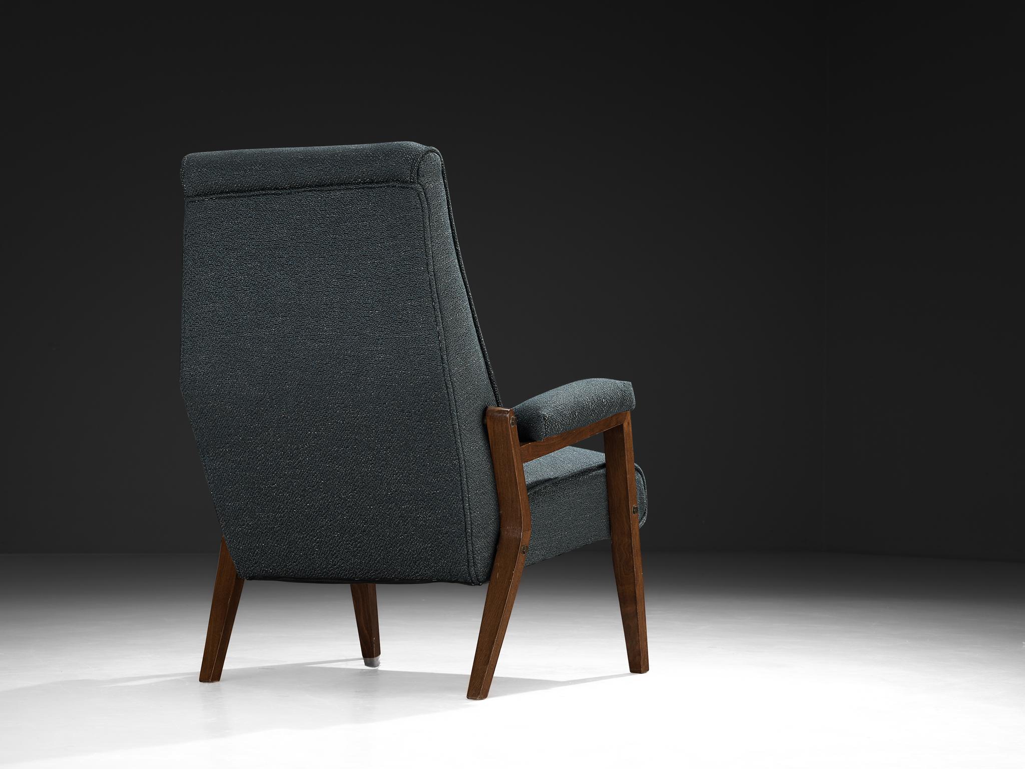 Easy chair, fabric, stained beech, metal, Italy, 1950s

This exceptional armchair designed and crafted in Italy is defined by its pronounced geometry and harmonious blend of textures and materials. The lounge chair showcases an intriguing wood