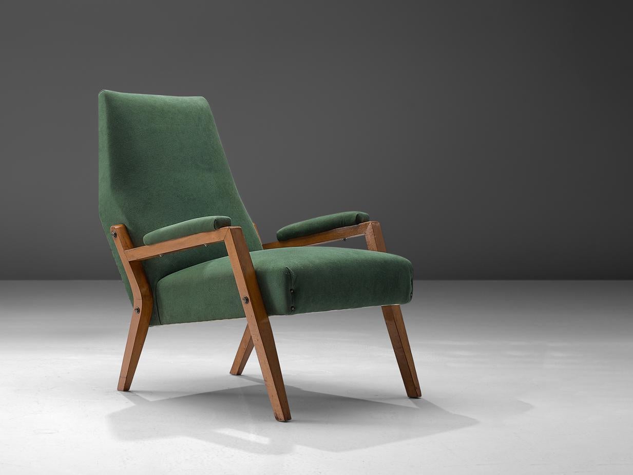 Easy chair, fabric, stained beech, metal, Italy, 1950s

This exceptional armchair designed and crafted in Italy is defined by its pronounced geometry and harmonious blend of textures and materials. The lounge chair showcases an intriguing wood