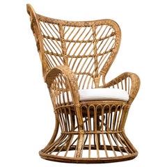 Italian High Wingback Rattan Armchair with White Felt Cushion by Lio Carminati