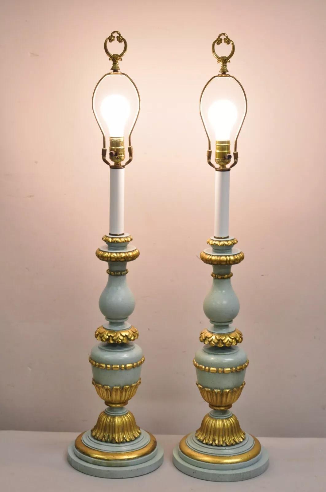 Vintage Italian Hollywood Regency Bluish Green & Gold Carved Wood Candlestick Table Lamps - a Pair. Circa Mid 20th Century. Dimensions : 38,5