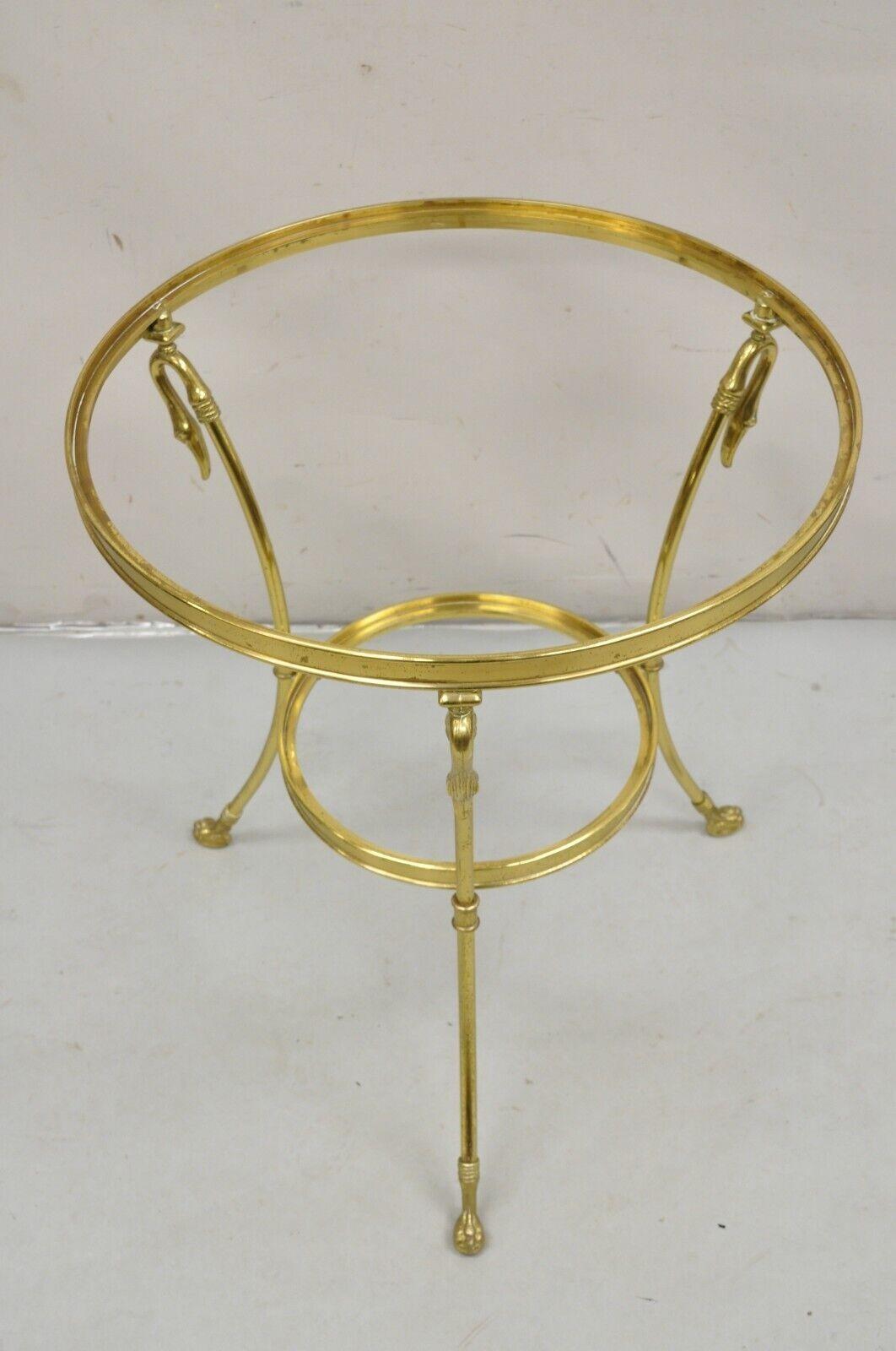 Vintage Italian Hollywood Regency Brass Swan Tripod 2 Tier Round Occasional Side Table (Does NOT include glass) Circa 1980s
Measurements: 26.75