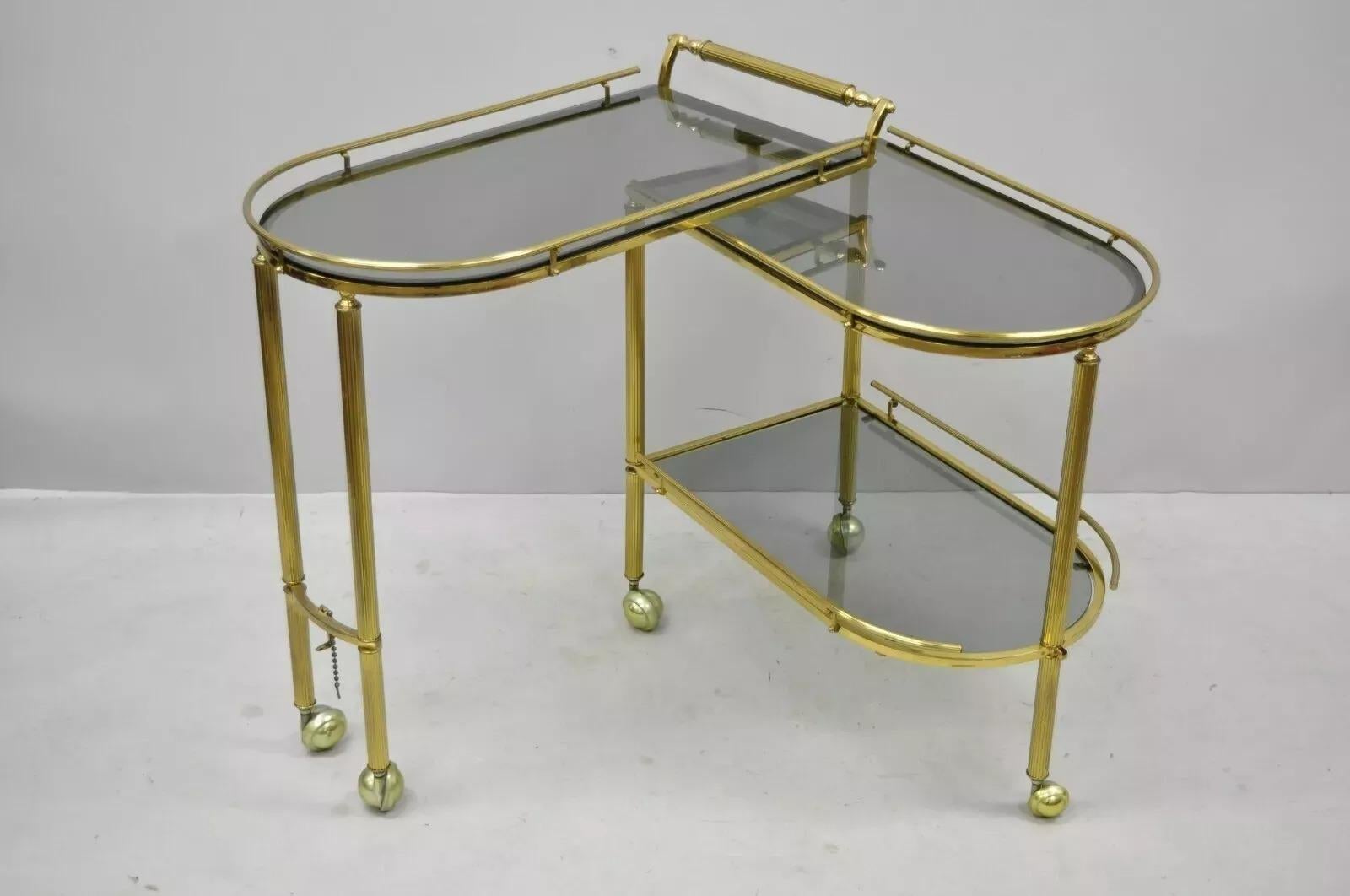 Unknown Italian Hollywood Regency Brass Swivel Rolling Bar Cart Server with Smoked Glass For Sale