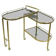 Italian Hollywood Regency Brass Swivel Rolling Bar Cart Server with Smoked Glass