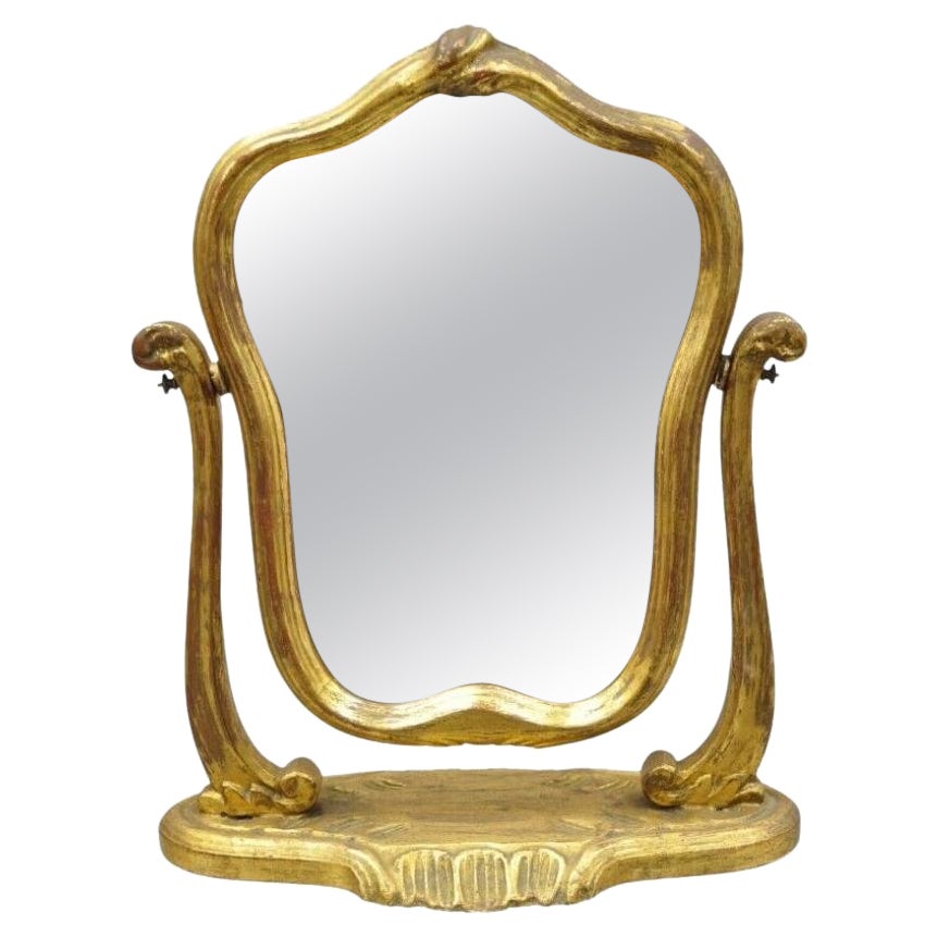 Espejo de tocador pequeño italiano Hollywood Regency tallado en madera dorada de giltwood envejecida