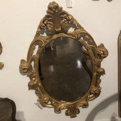 Italian Hollywood Regency Carved Wood Oval Mirror with Gold Leaf and Acanthus
