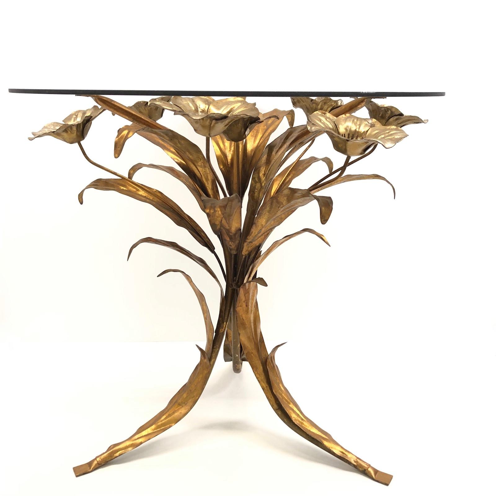 Offered is this beautiful Hollywood Regency gilded and silvered rose flower accent table with smoked glass top. Made in Italy.