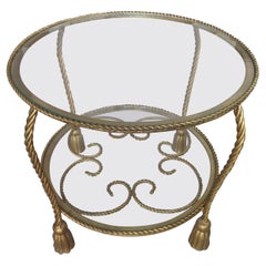 Tavolo Hollywood Regency italiano in metallo dorato e nappe