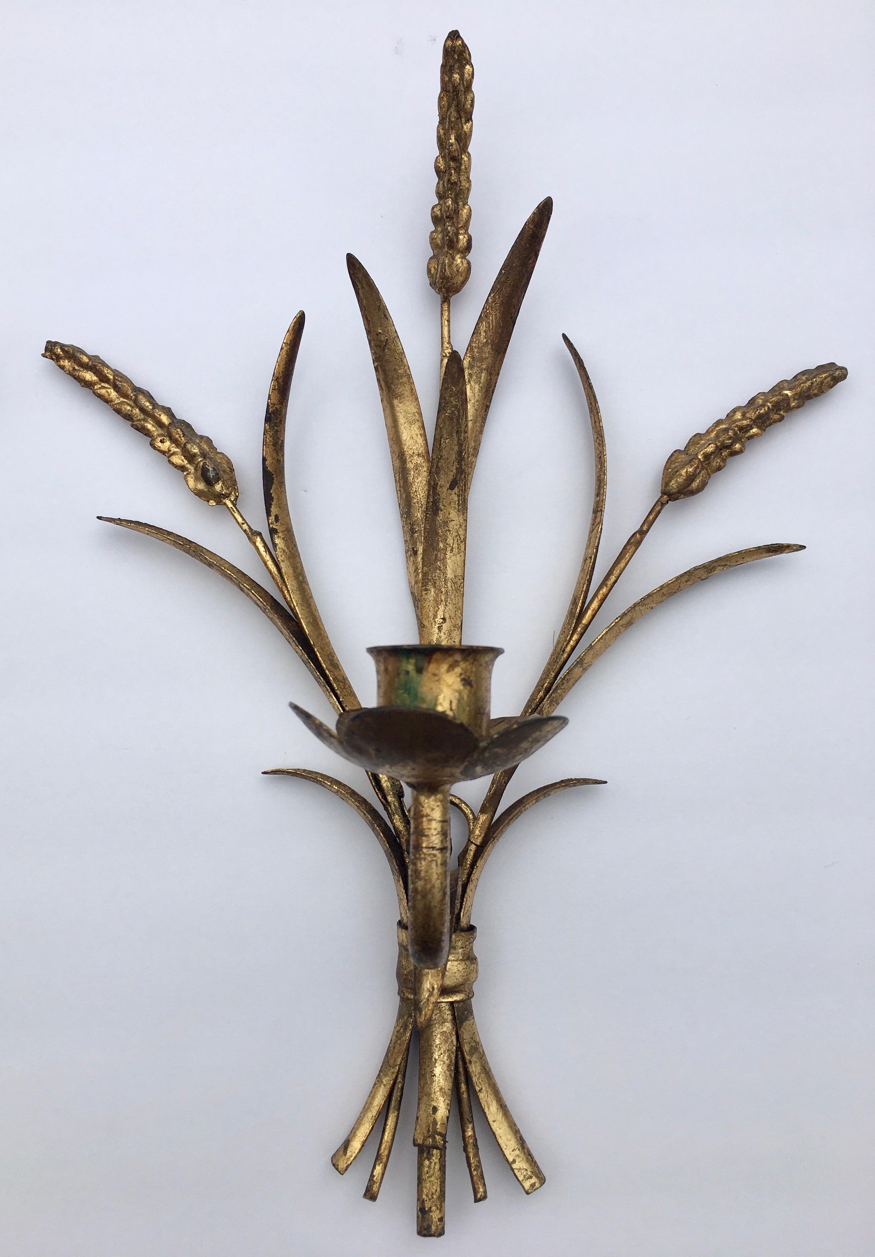 Pair of Italian Hollywood Regency gilt metal tole sheaf of wheat candle wall sconces. Marked 'Made In Italy'.