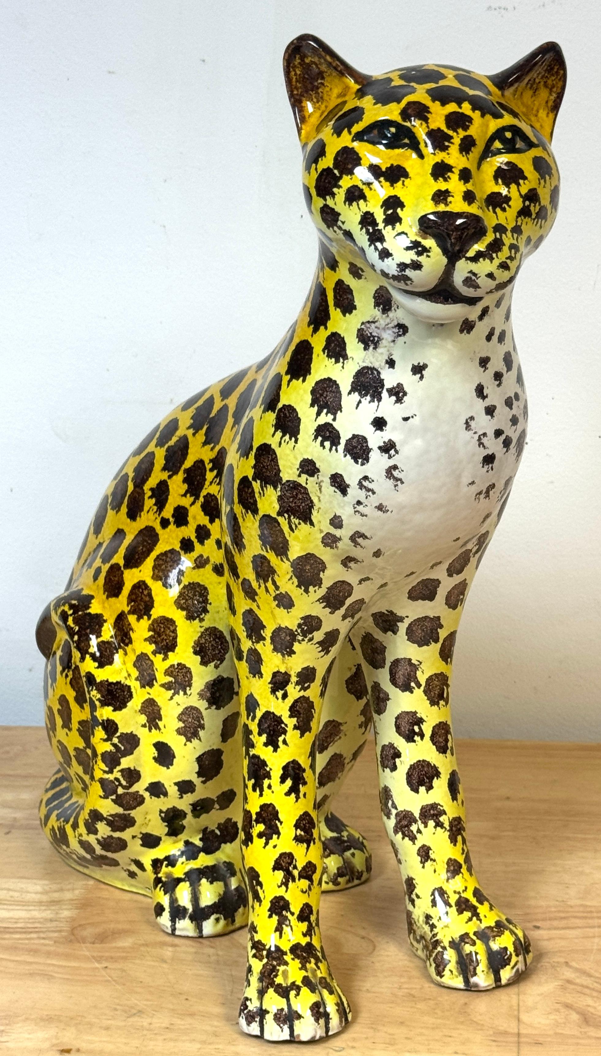 Italian Hollywood Regency Glazed Terracotta Leopard Cub, 1960s

A striking Italian glazed terracotta leopard cub, dating to the mid-20th century. Hand-molded and vividly hand-painted, this figure embodies the exotic glamour and playful presence of a