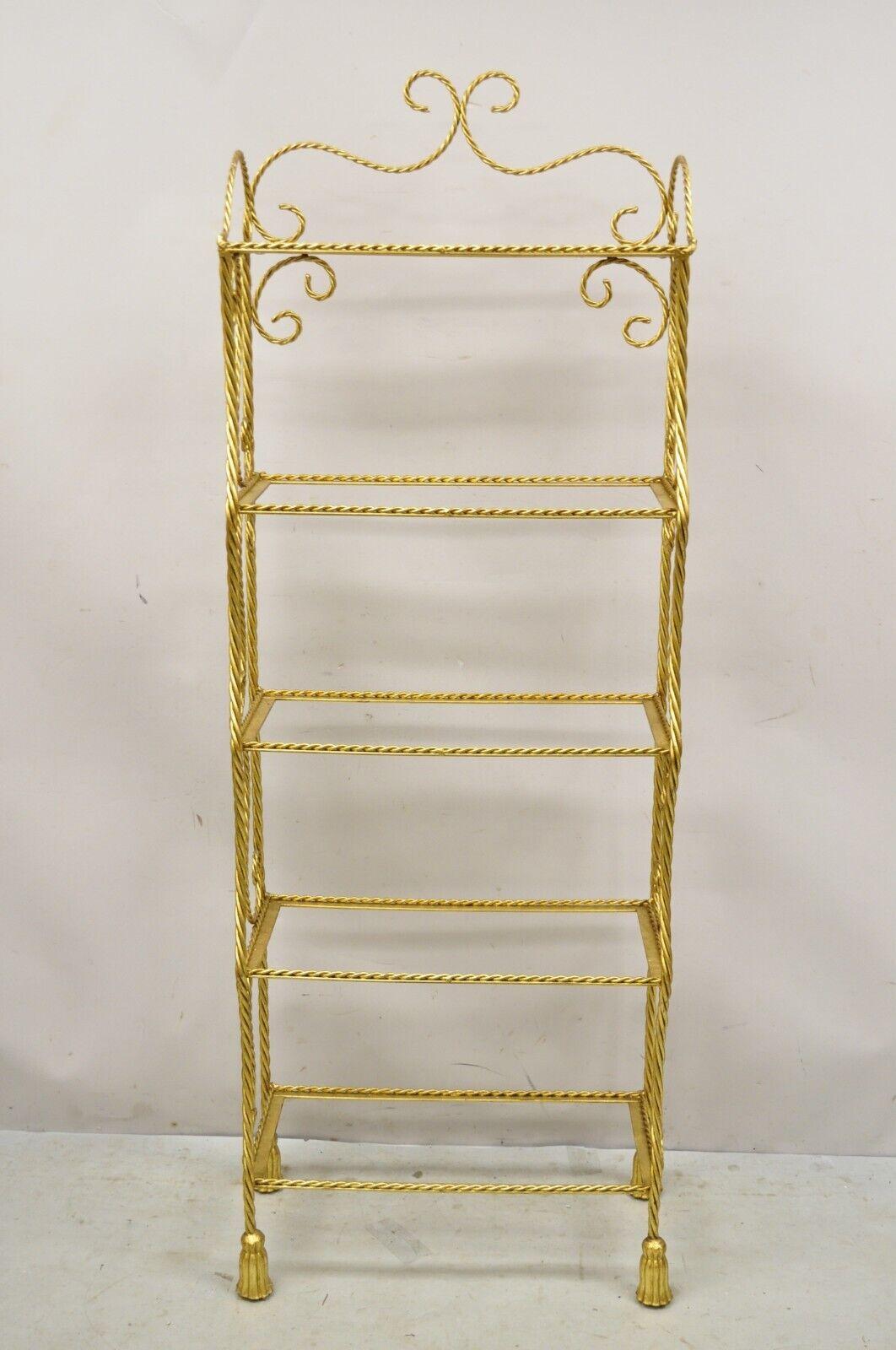 Italian Hollywood Regency Gold Gilt Iron 5 Tier Rope Tassel Narrow Etagere Stand. Item features gold gilt iron frame, rope design with tassel feet, 5 tiers (no glass shelves), wrought iron construction, very nice vintage item, quality Italian