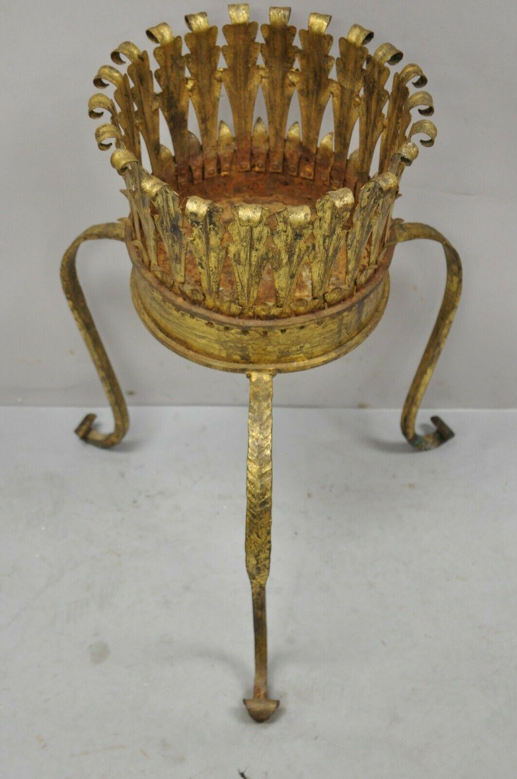 Italian Hollywood Regency gold gilt iron tole metal plant stand planter. Item features scrolling iron frame, gold gilt finish, scrolling legs, distressed finish, very nice vintage item, great style and form. Circa Mid 20th Century. Measurements: 22