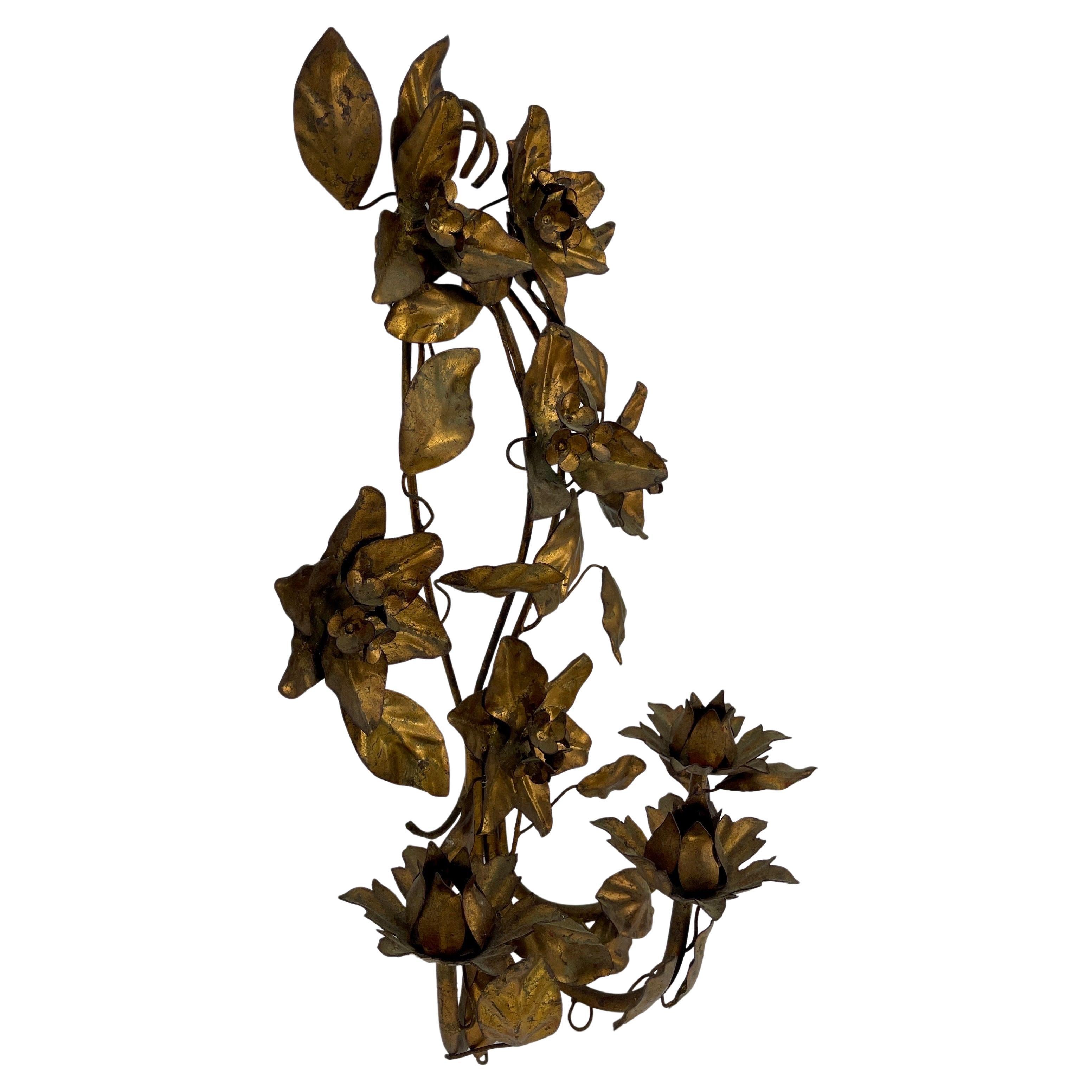 Vintage Gold Gilt Tole Metal Wall Floral Candle Sconce, Italy 

Elegant wall candle sconce with beautiful floral leaf detail throughout. The hand-painted gold gilded finish on this piece has a very pleasing aged look. This classic and very detailed