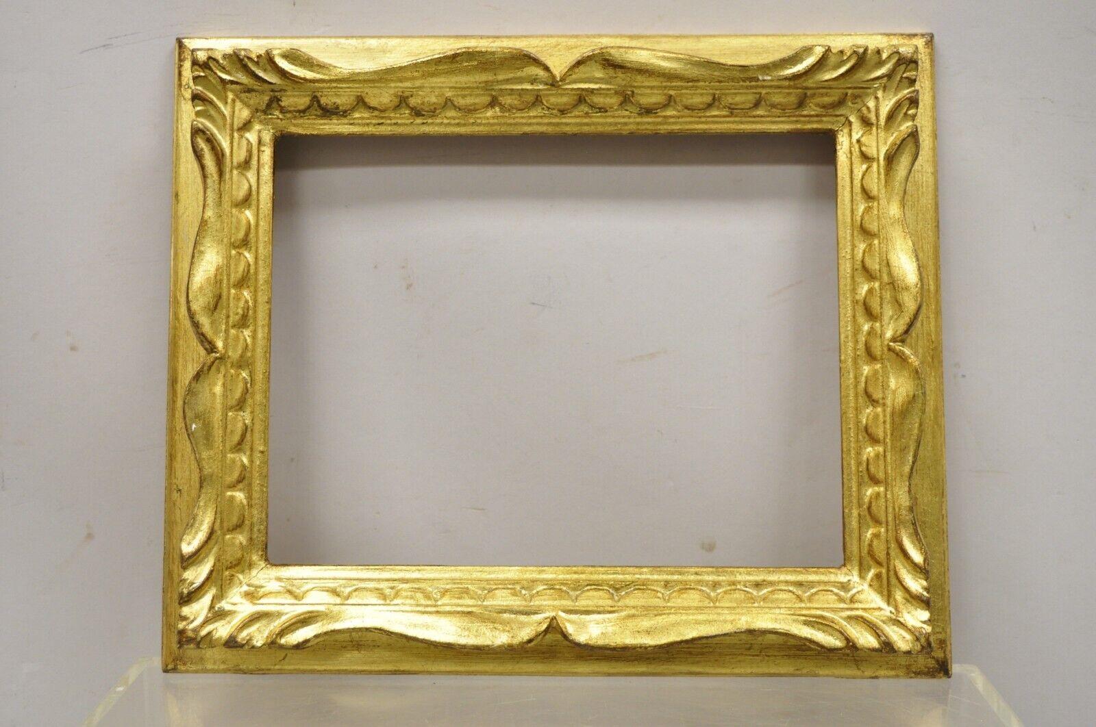 Vintage Italian Hollywood Regency gold gilt wood art picture frame 14x12 (New old stock) - multiple. Item features a gold gilt finish, solid wood frame, nicely carved details, original stamp, quality Italian craftsmanship, great style and form.