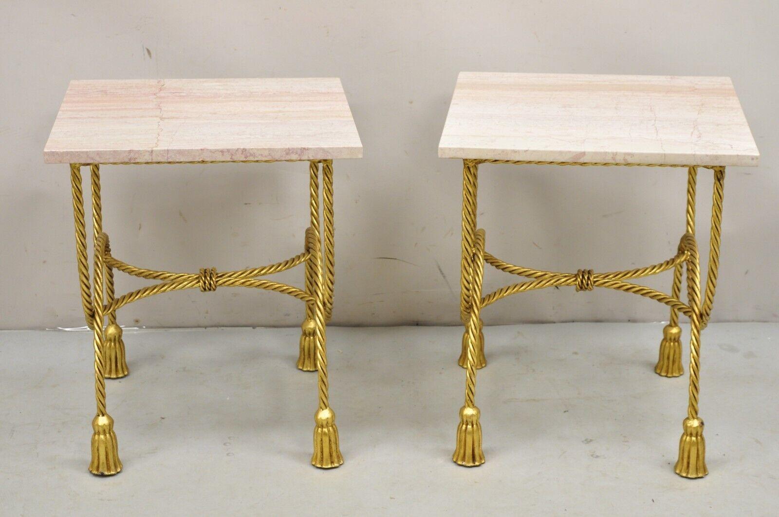 Italian Hollywood Regency Gold Gilt Iron Rope Tassel Pink Marble Top Side Tables - a Pair. Item features Marble tops, tassel form feet, iron metal scrolling rope design frame, gold leaf gilt finish, very nice vintage side tables, quality Italian