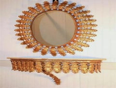 Italian Hollywood Regency Gold Iron Sunburst Mirror and Marble Top Wall Console