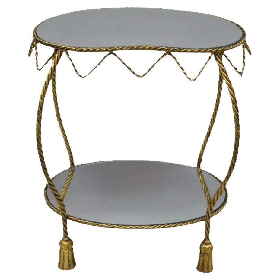Mesa auxiliar con tapa de espejo en forma de riñón y borlas doradas de la Regencia de Hollywood italiana