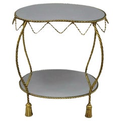 Italienischer Hollywood-Regency-Beistelltisch mit Spiegelplatte in Knochenform, Gold Seil und Quaste