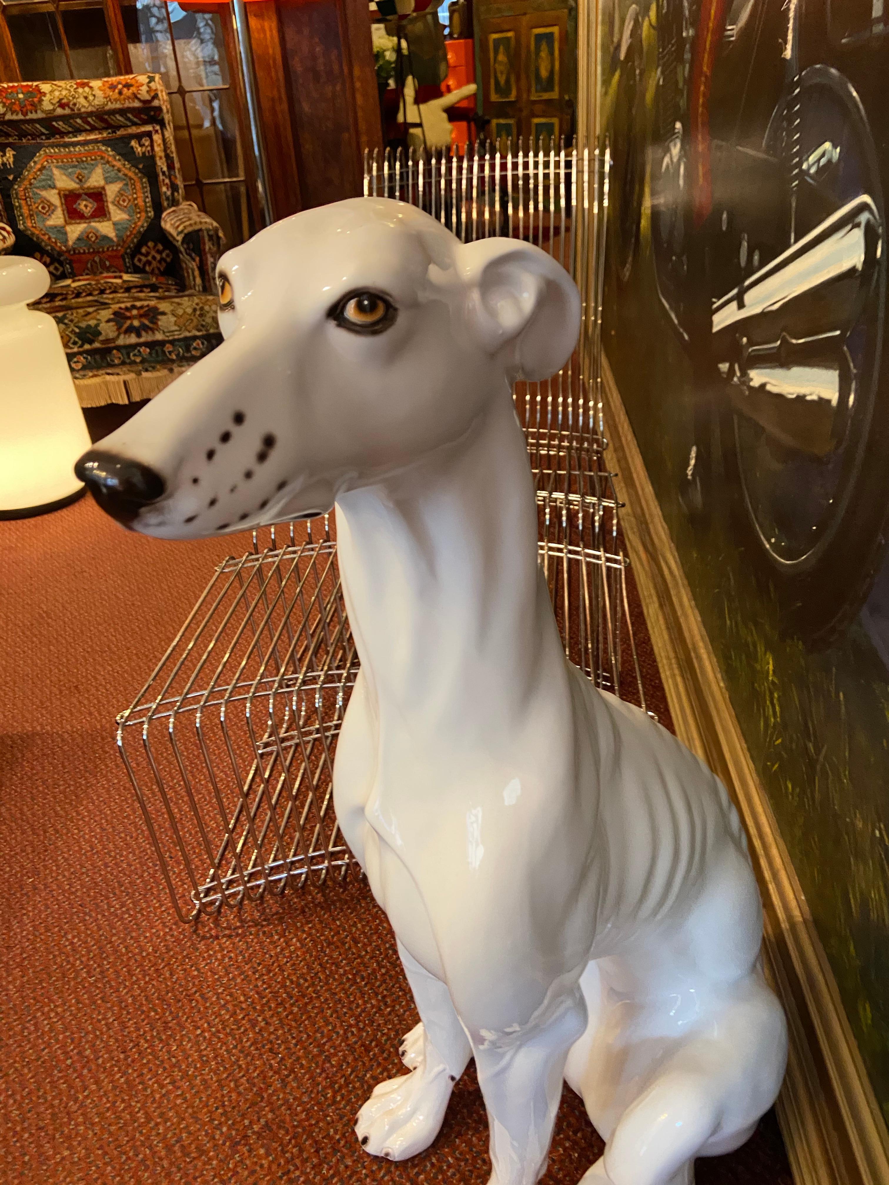 A wonderful, charming Italian Hollywood Regency life-size ceramic greyhound.

Beautiful statement piece for your home.

This stunning greyhound is free from cracks, chips or repairs and is in excellent condition.