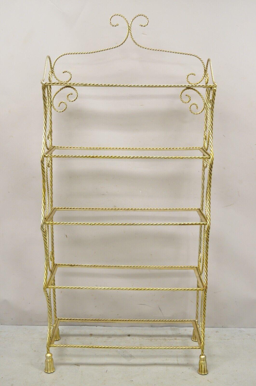 Italian Hollywood Regency Rope Tassel Silver Gold 5 Tier Iron Bakers Rack Shelf. Item features has(5) tiers (no glass), iron rope form frame, silver/gold gilt leaf finish, scrolling design, quality Italian craftsmanship. Circa Mid 20th