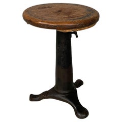 Italian industrial round stool in cast iron and wood, 1930s