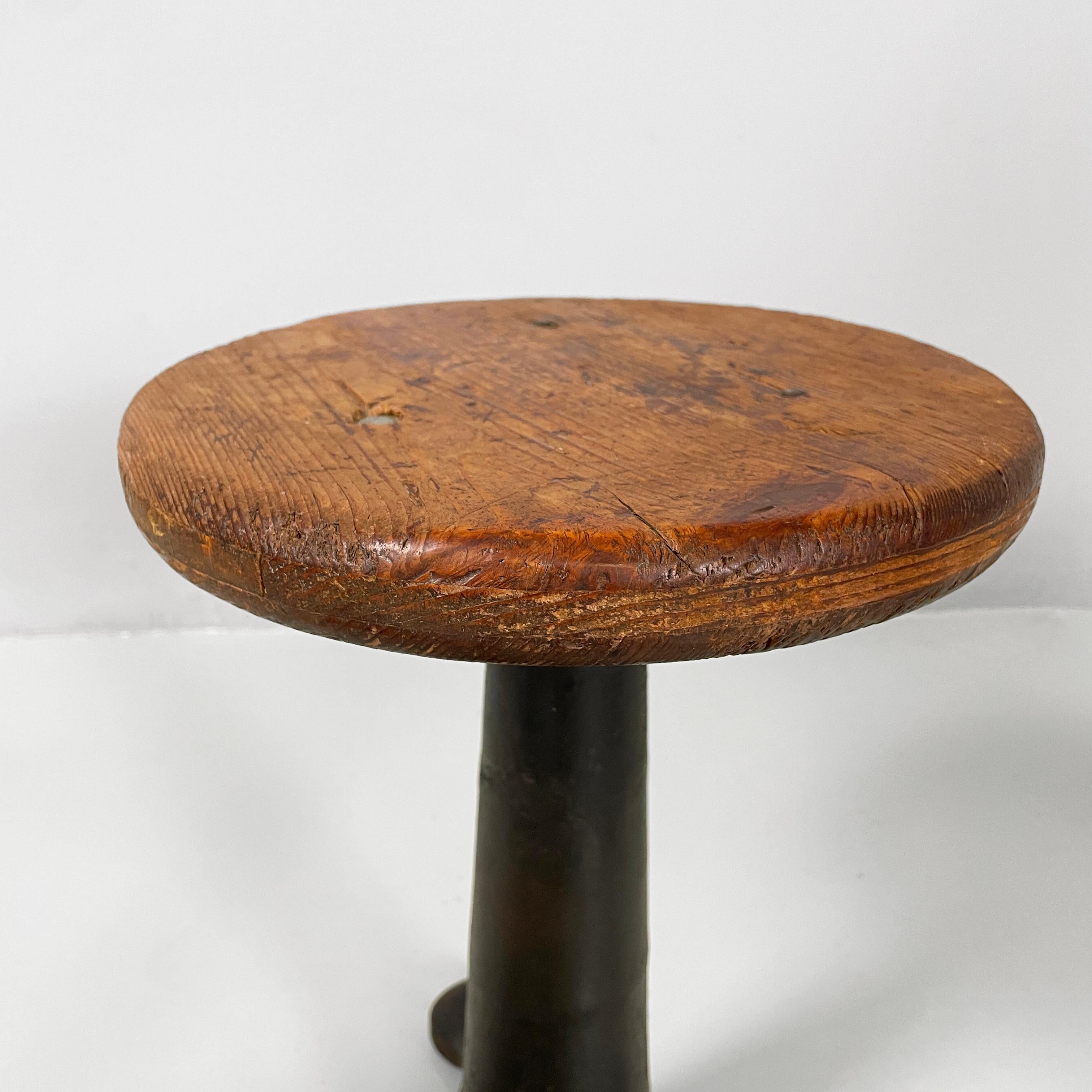 Ironstone Italian industrial round stools in wood and cast iron, 1930s in vendita