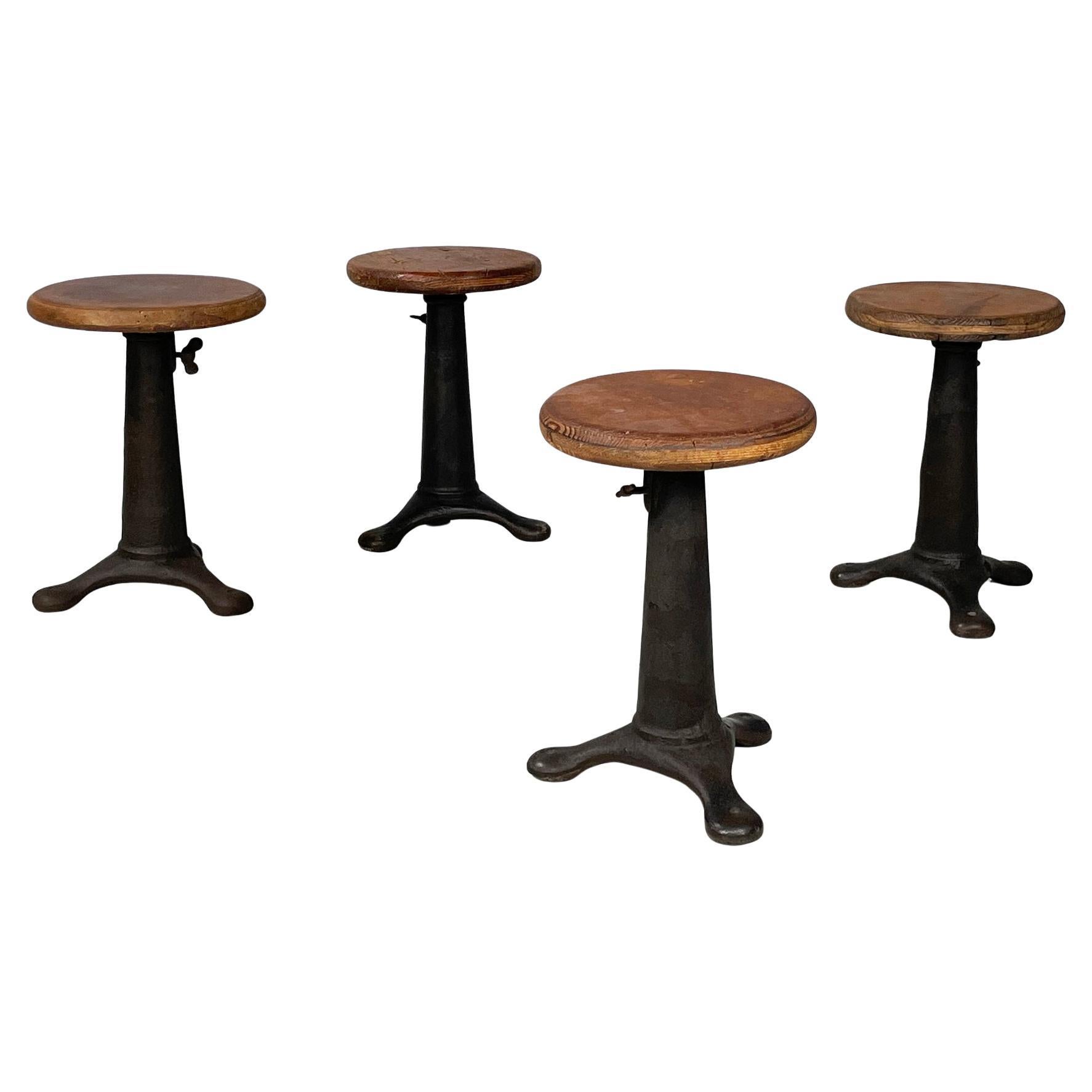 Italian industrial round stools in wood and cast iron, 1930s in vendita
