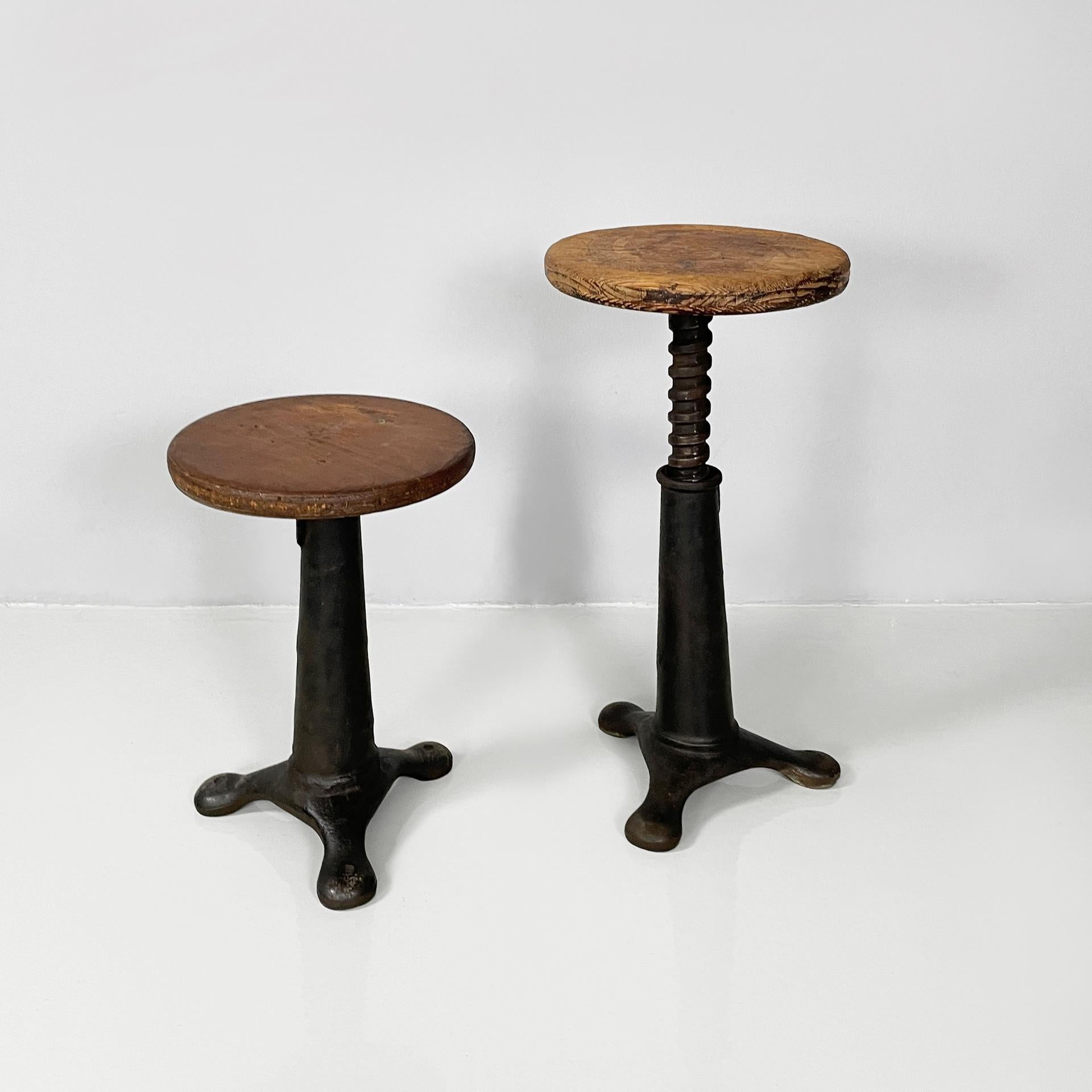 Italian industrial round stools in wood and cast iron, 1930s
Set of four stools with round wooden seat. The seat is adjustable in height. Cast iron conical base with three rounded legs.
1930s.
Vintage condition. The wood shows various signs of