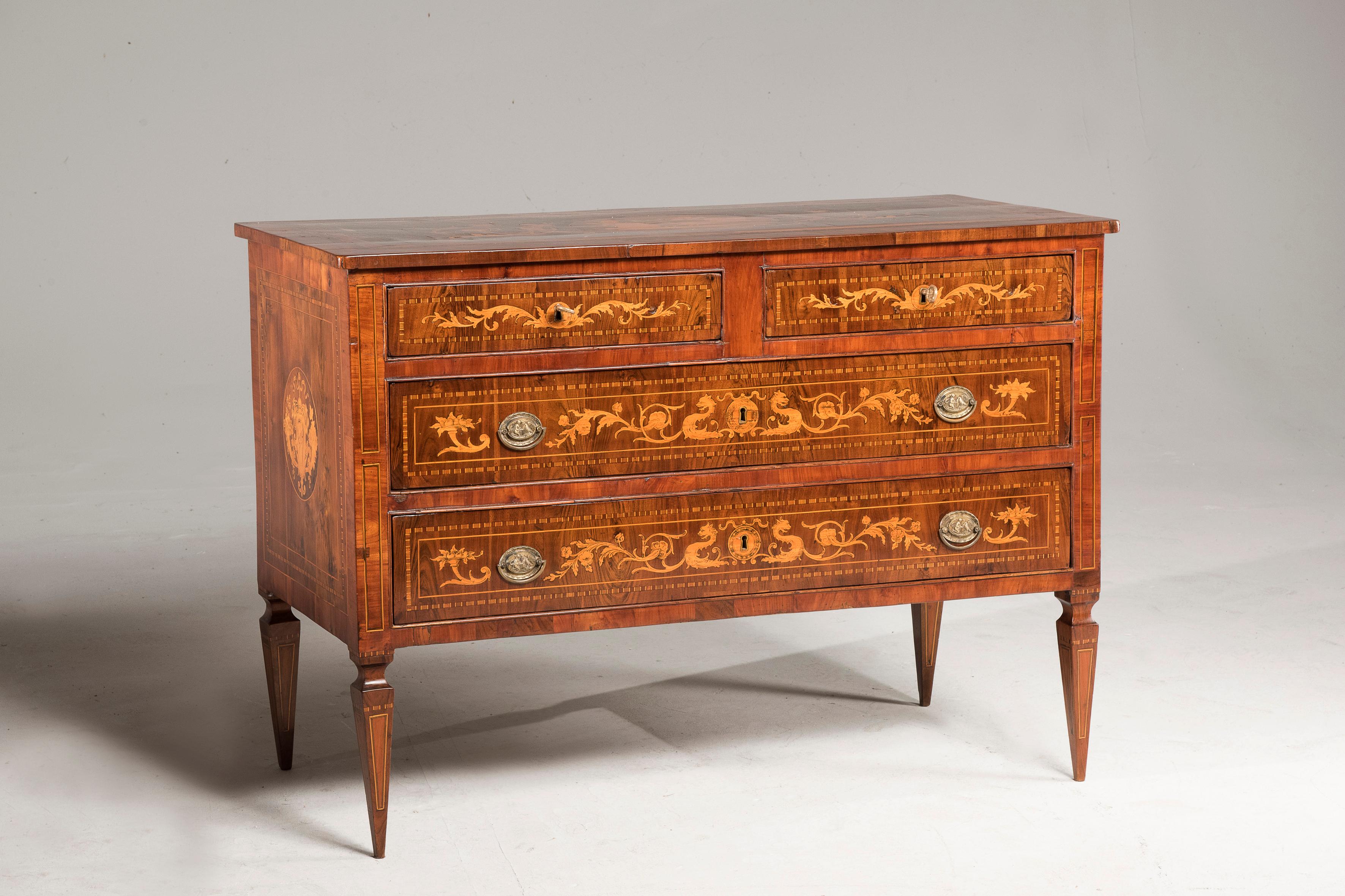 Italian (from Lombardia Region) Louis xvi period chest of drawers.

Inlaid with different wood essences. Original back and inner parts besides handles and lockers. Conservative restoration of wooden parts.

Size: TBC.