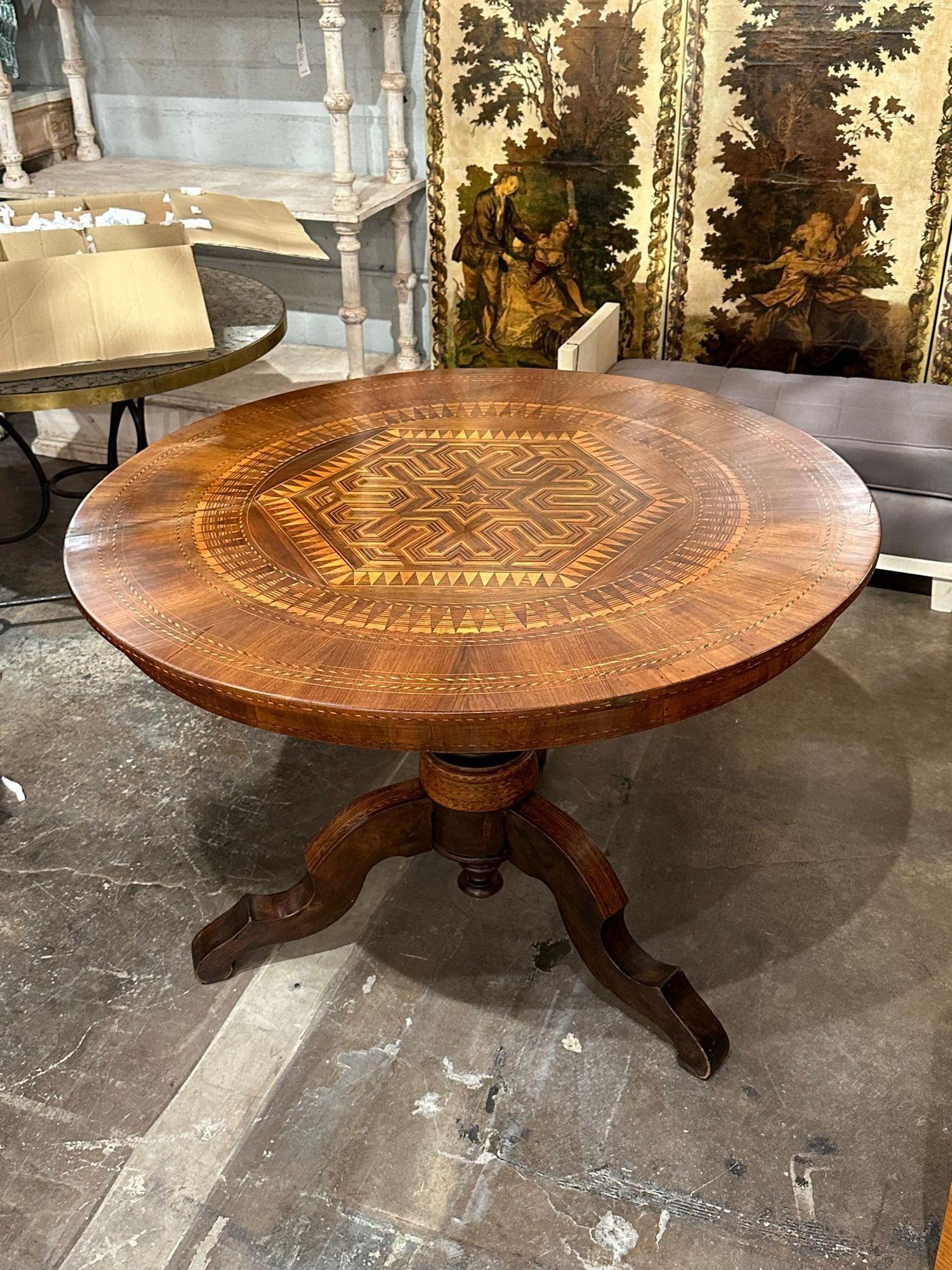 19th century Italian inlaid walnut center table from Sorento, circa 1870. A timeless and Classic touch for a fine interior.