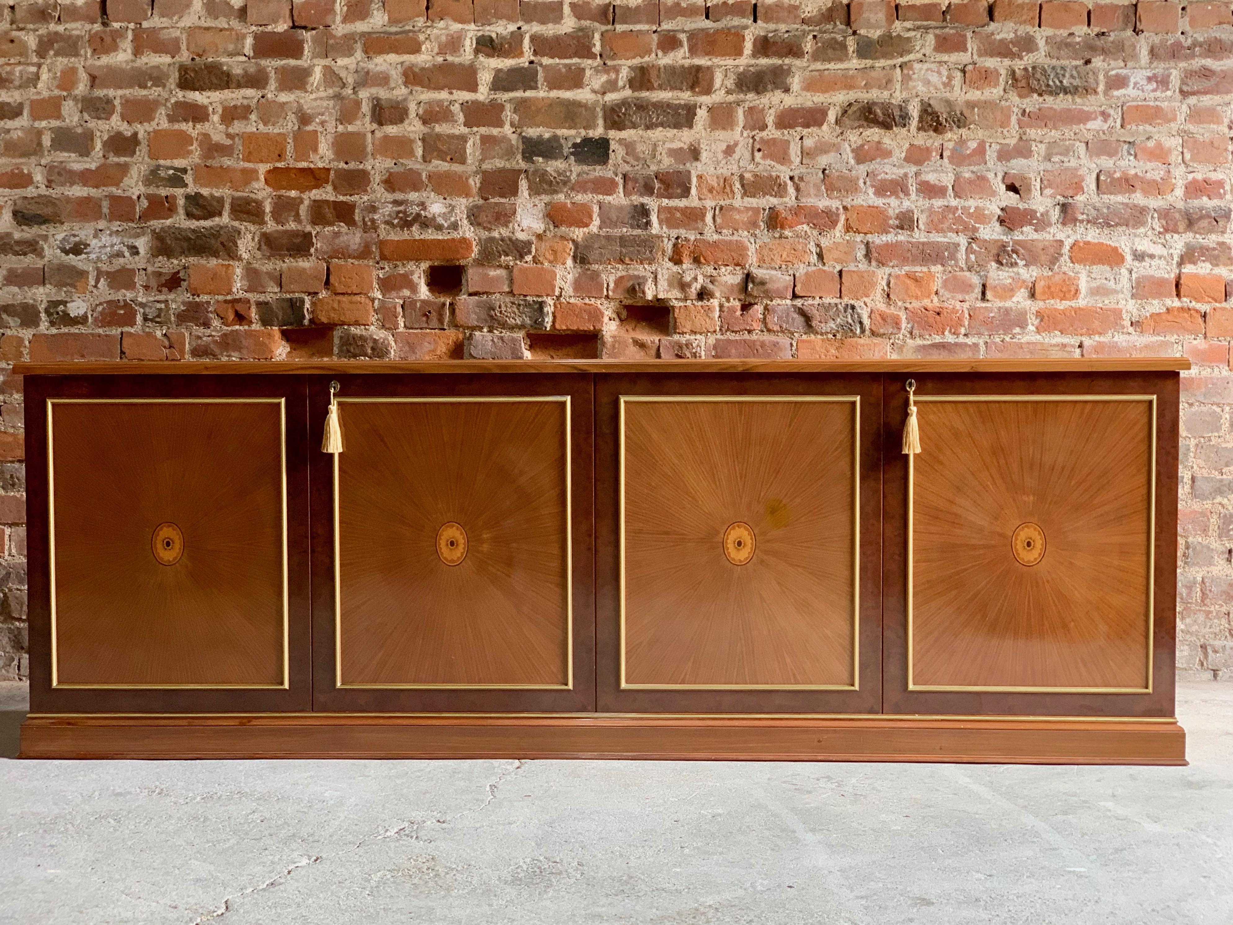 Stunning large late 20th century Italian walnut lacquered credenza or sideboard of the highest quality.

The long and sleek rectangular top with fabulous inlaid marquetry work with floral scrolls and patterns richly inlaid in walnut, mahogany and