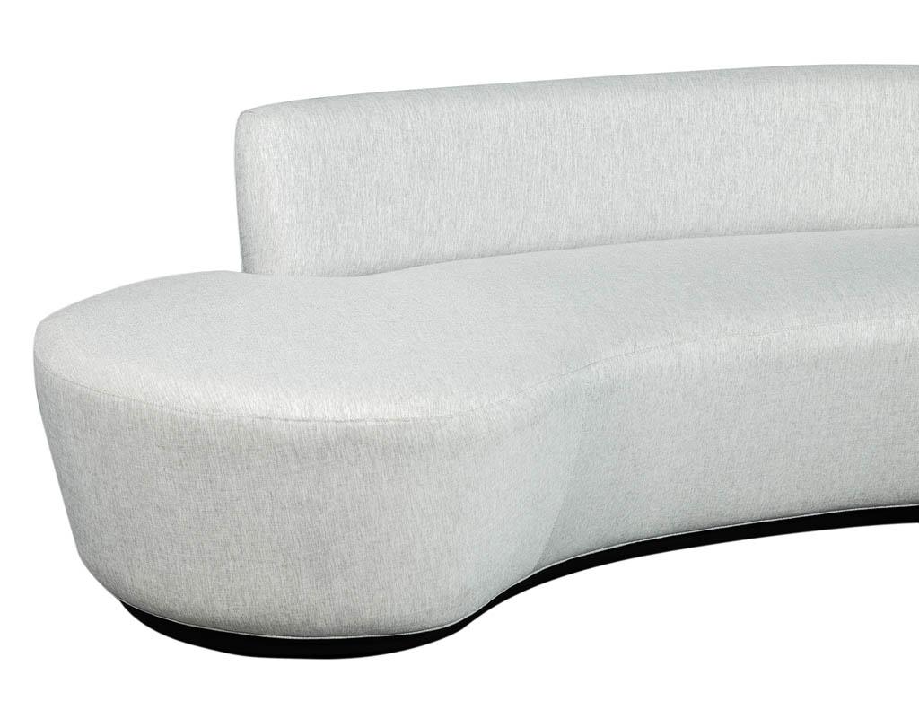 grey curved sofa