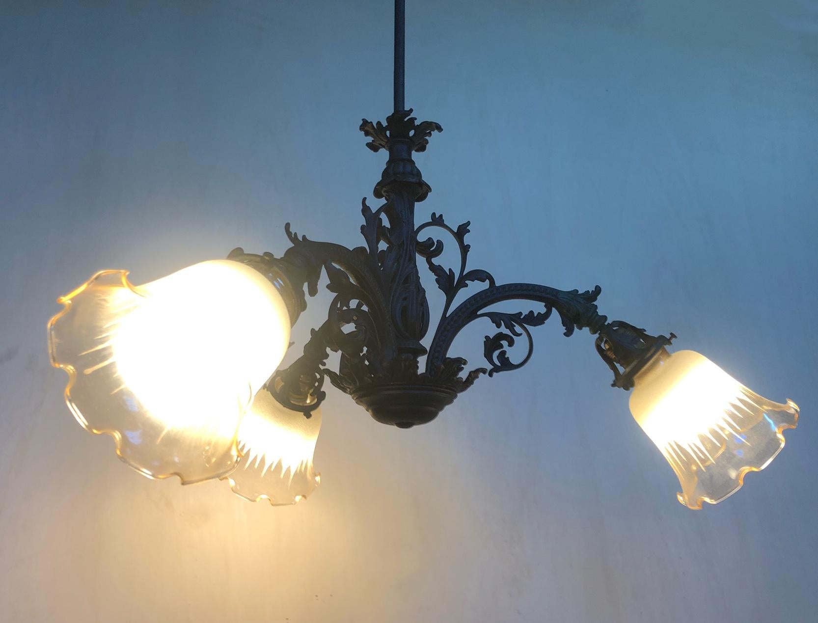 Italian iron chandelier with 3 lights very strong.
Original from 1970. 
Very beautiful special iron patinated.
Comes from an old city villa in the Lucca area of Tuscany.
As shown in the photographs and videos, there are some small imperfect